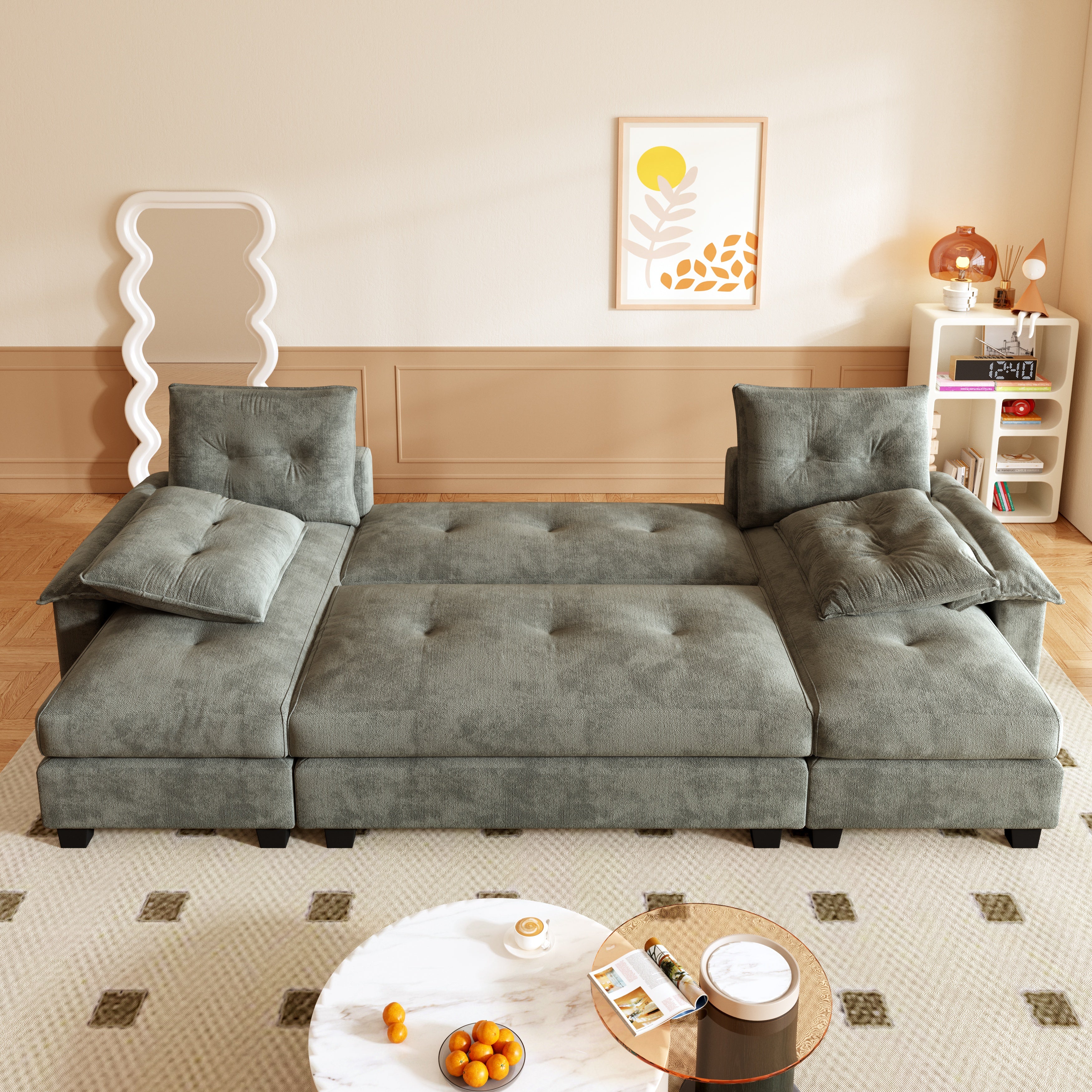 Clovis grey sleeper sofa bed showing fully extended layout in lifestyle setting
