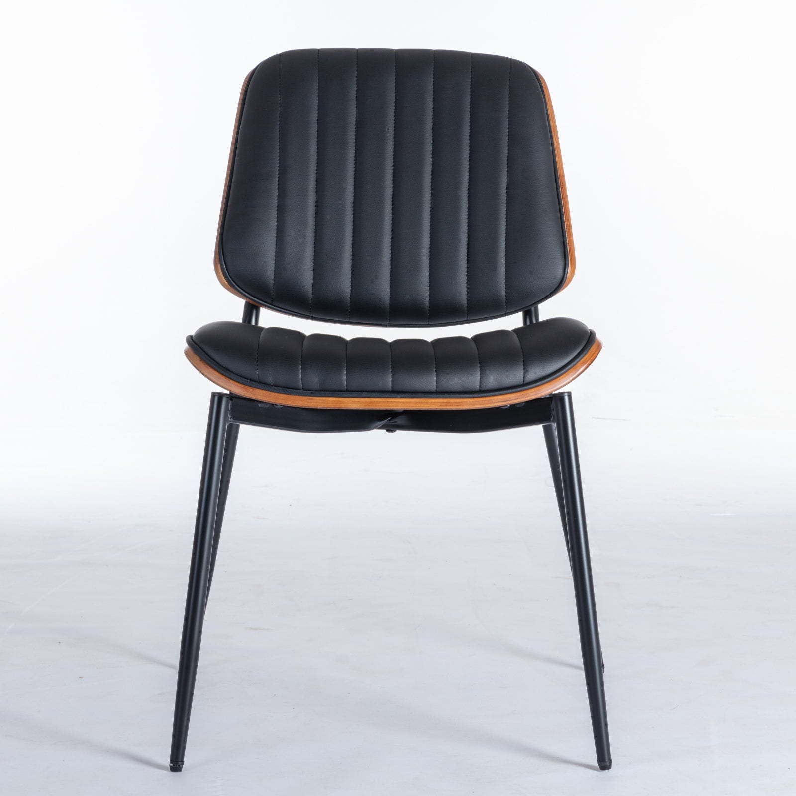 Colorado black PU leather dining chair front angled view with wood back on white background