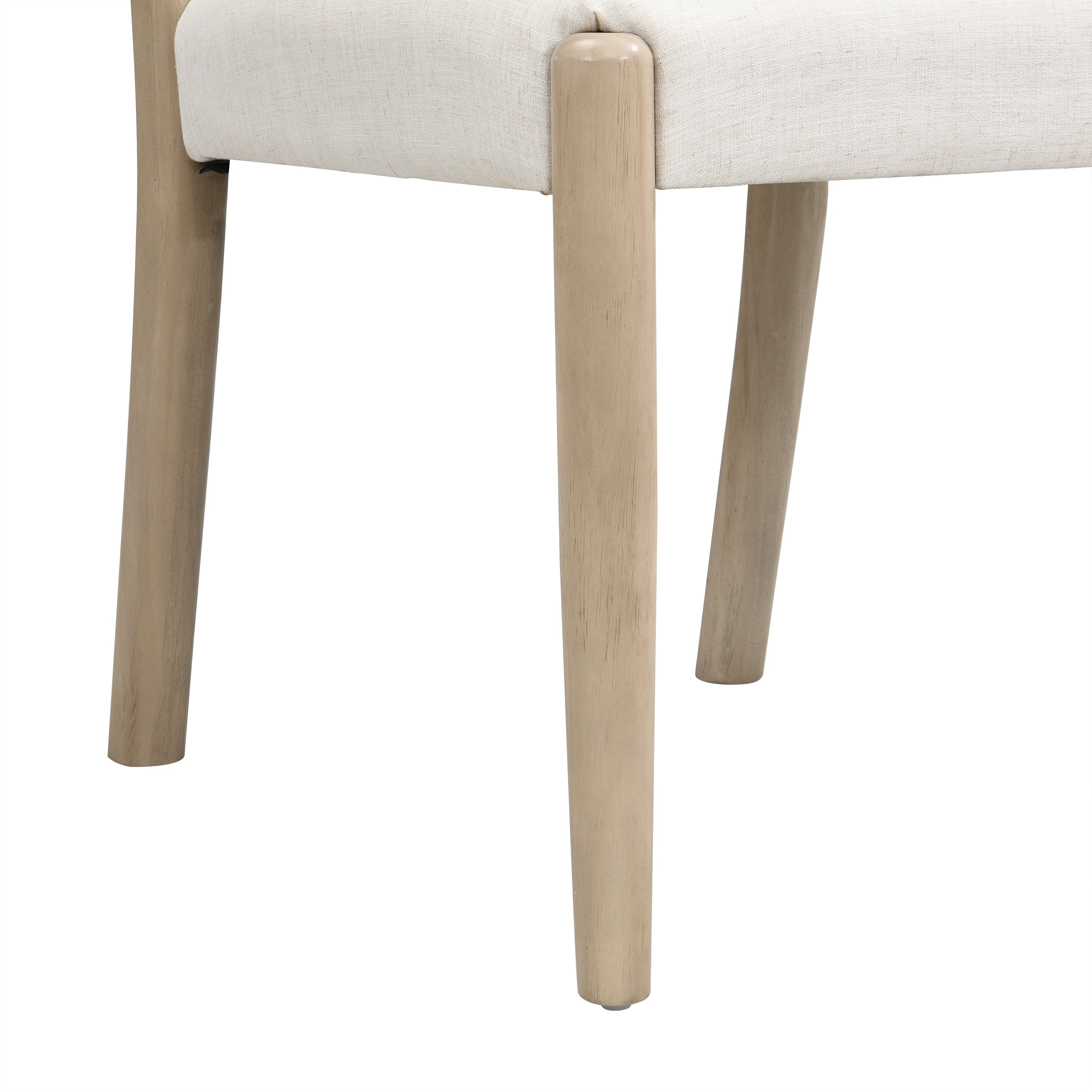Constance natural dining chair close-up of the tapered rubberwood leg and upholstered seat