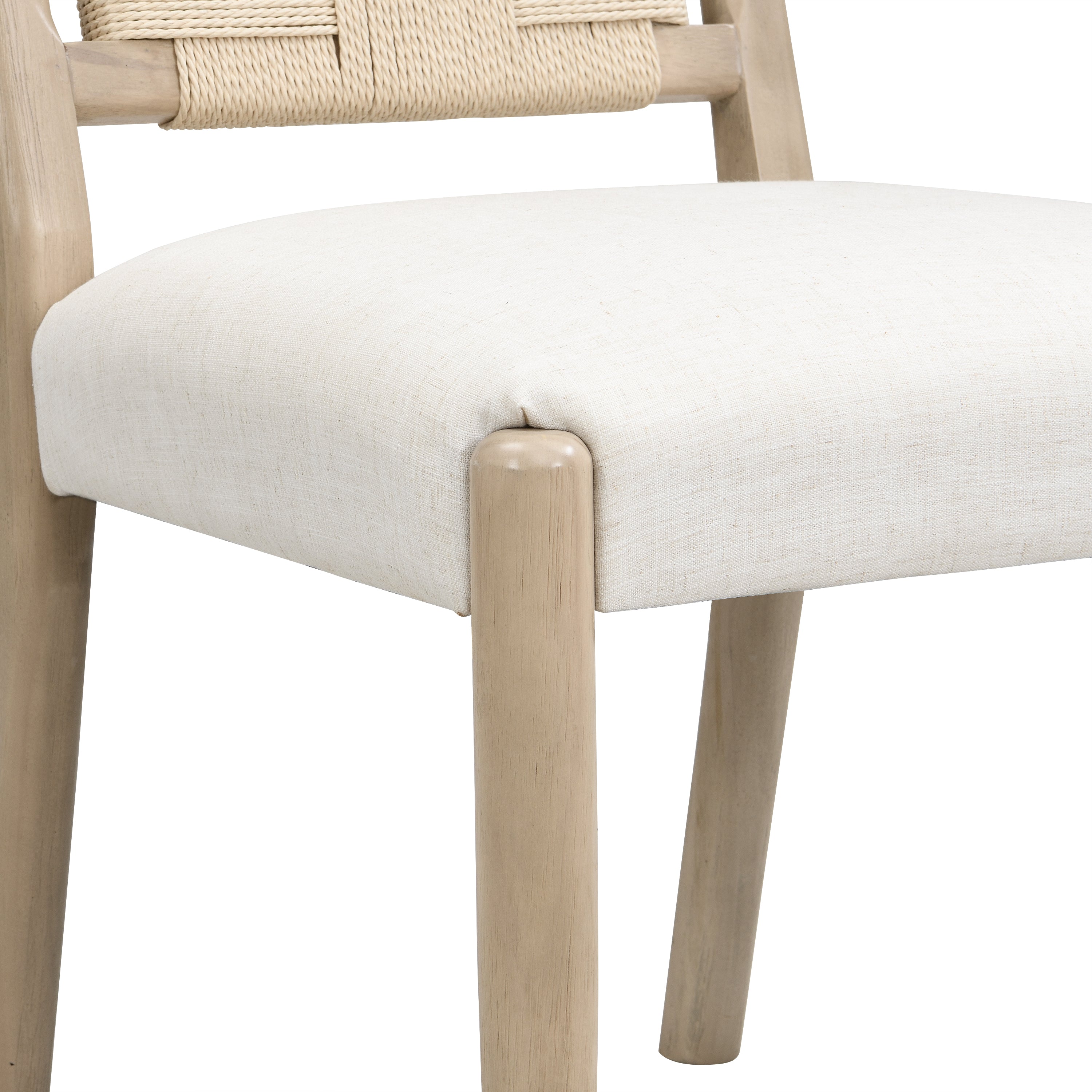 Constance natural dining chair close-up of the padded seat and woven back construction