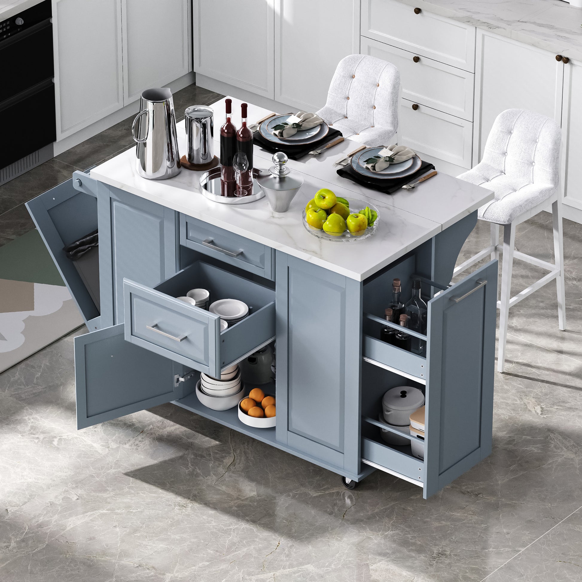 Deauville gray kitchen island showing expanded dining and serving workspace with drawers pull-out organizers hidden trash cabinet and bar seating