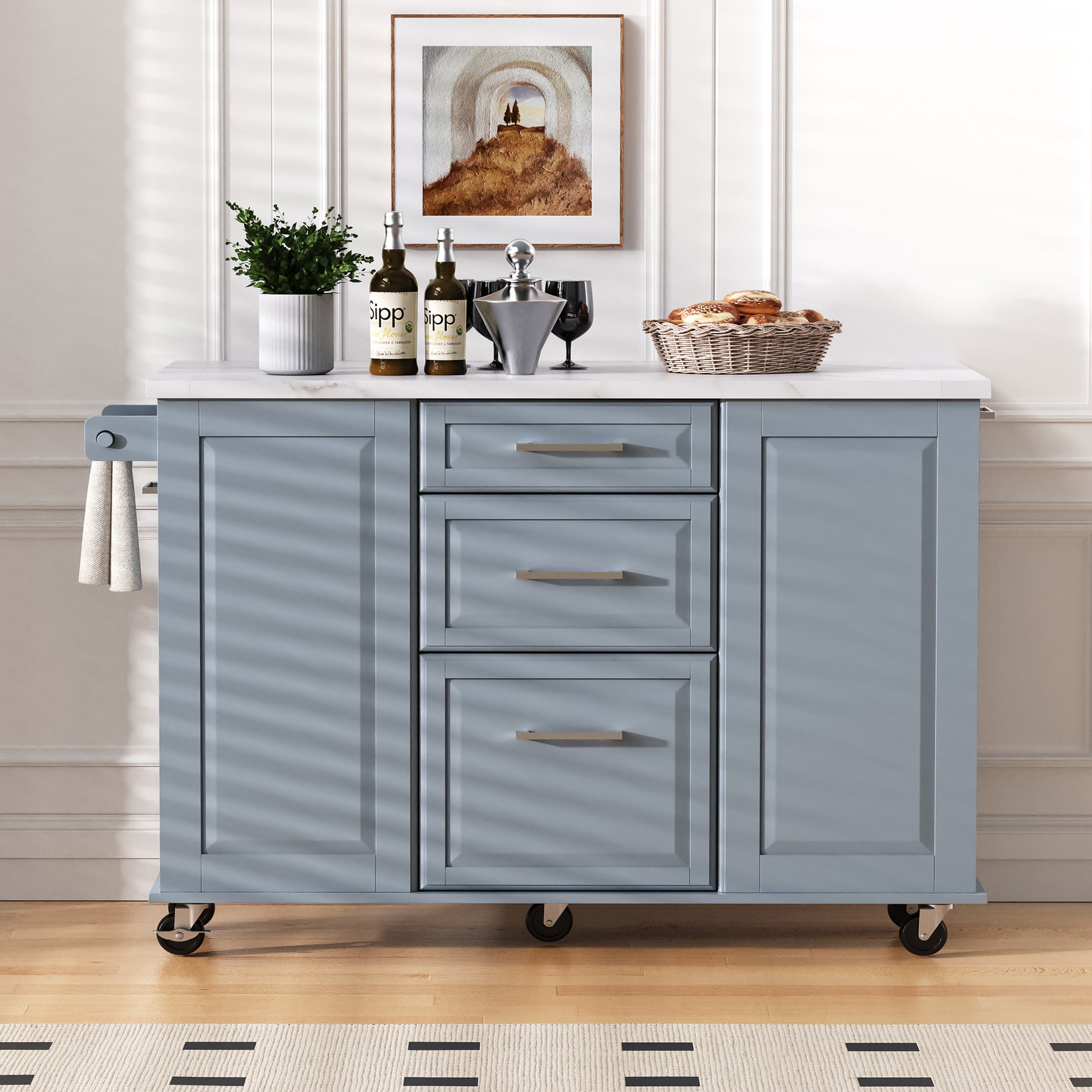 Deauville gray kitchen island showing drop leaf countertop drawers storage cabinets towel bar and rolling caster wheels