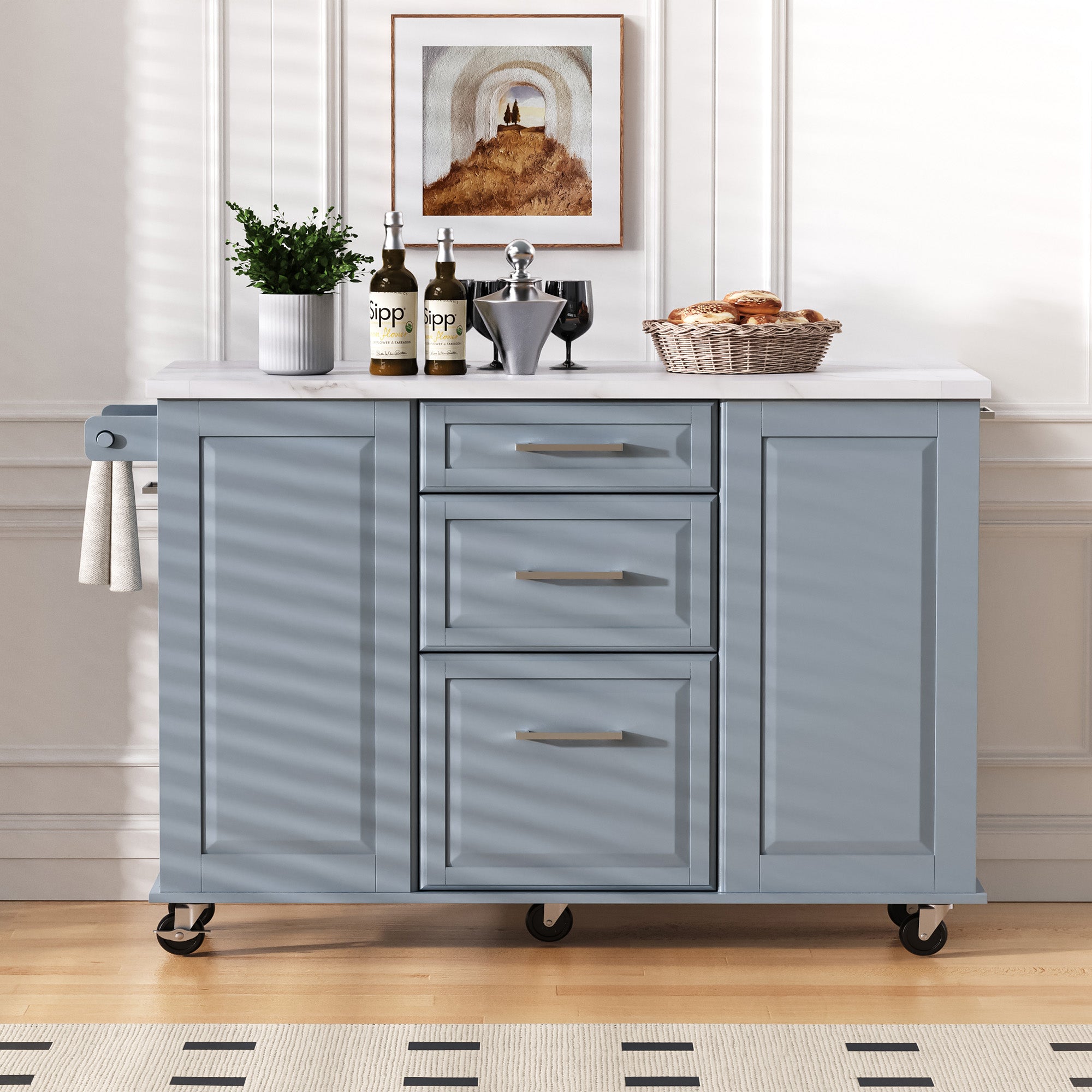 Deauville gray kitchen island showing drop leaf countertop drawers storage cabinets towel bar and rolling caster wheels
