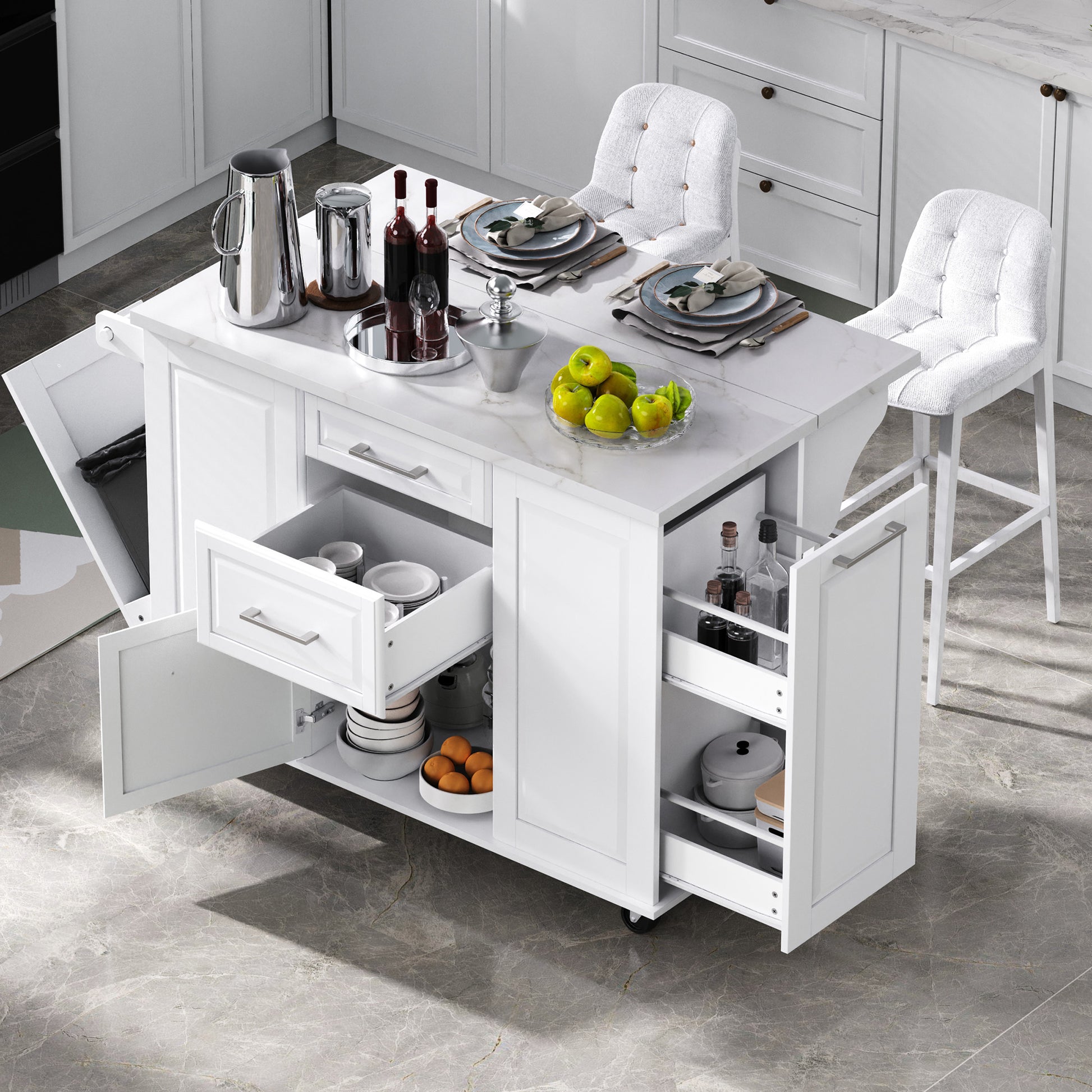 Deauville white kitchen island showing expanded dining and serving workspace with drawers pull-out organizers hidden trash cabinet and bar seating