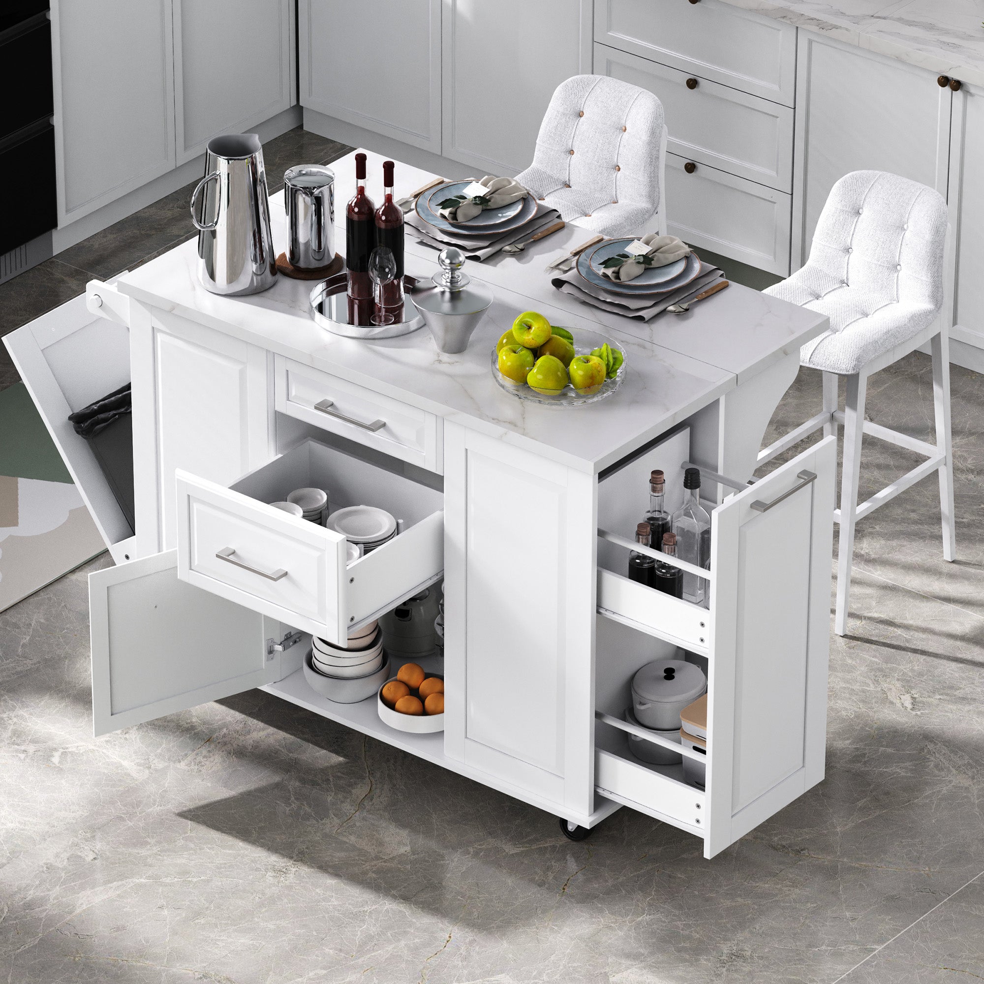 Deauville white kitchen island showing expanded dining and serving workspace with drawers pull-out organizers hidden trash cabinet and bar seating