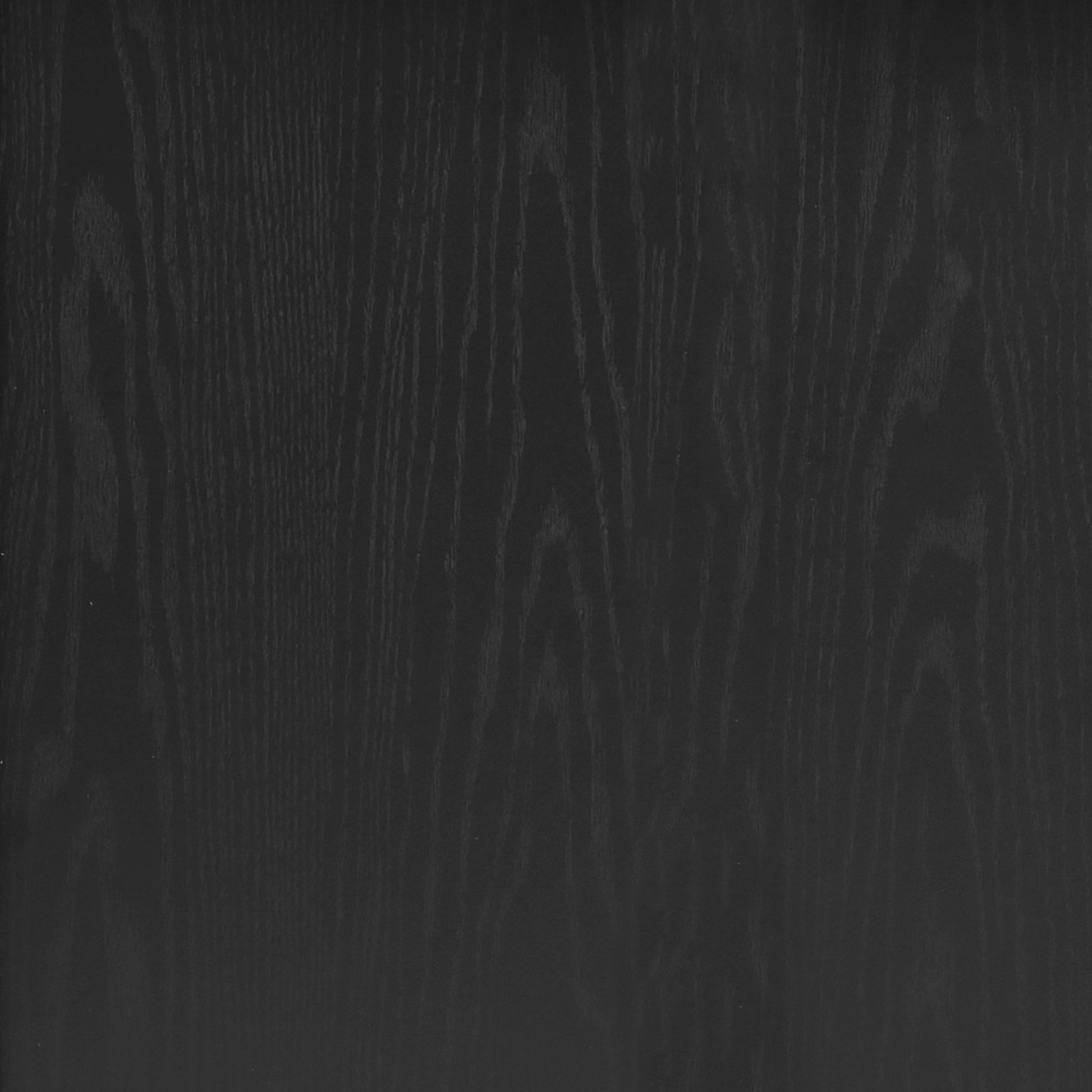 Close-up detail of black wood grain finish on Dijon farmhouse rolling kitchen island surface isolated on white background