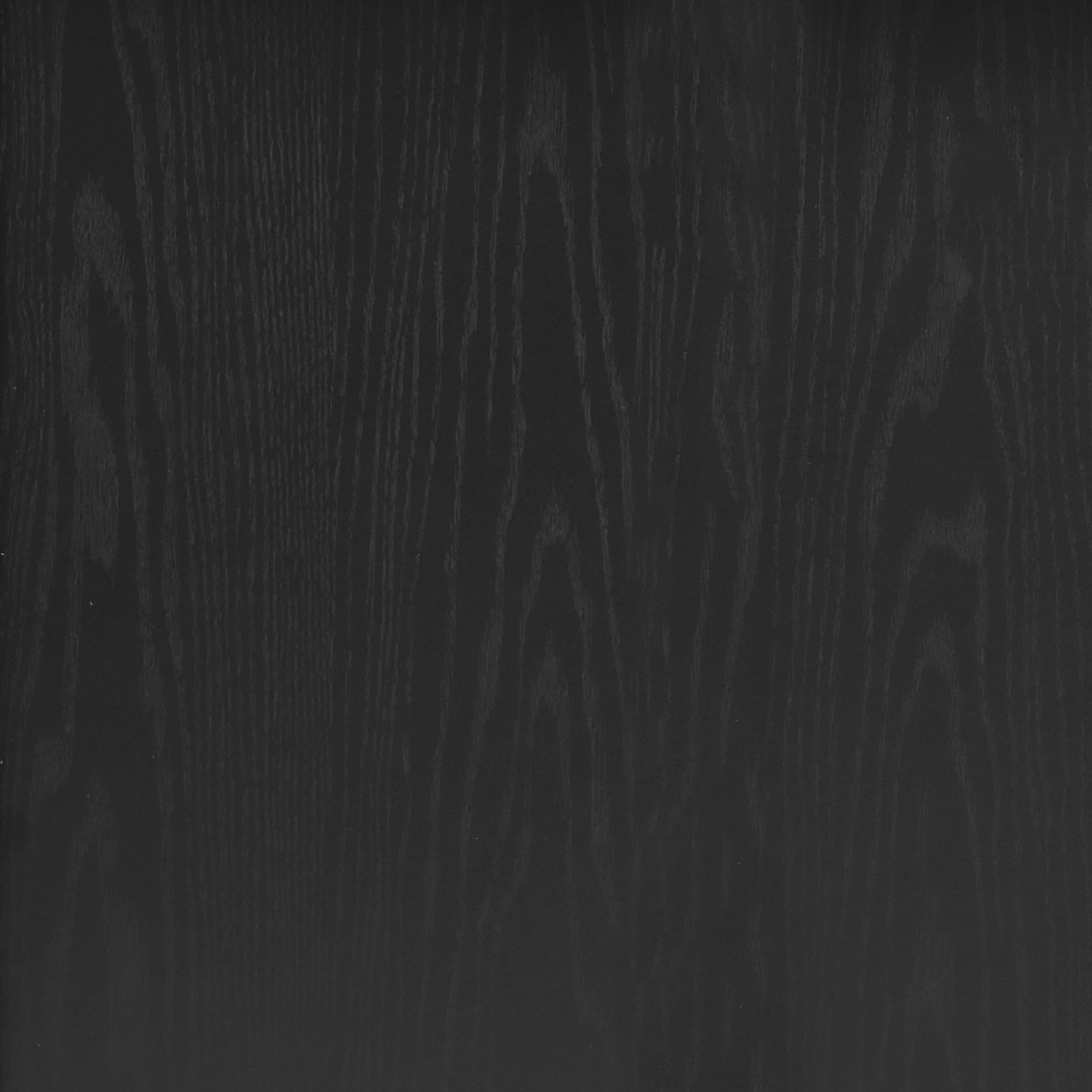 Close-up detail of black wood grain finish on Dijon farmhouse rolling kitchen island surface isolated on white background
