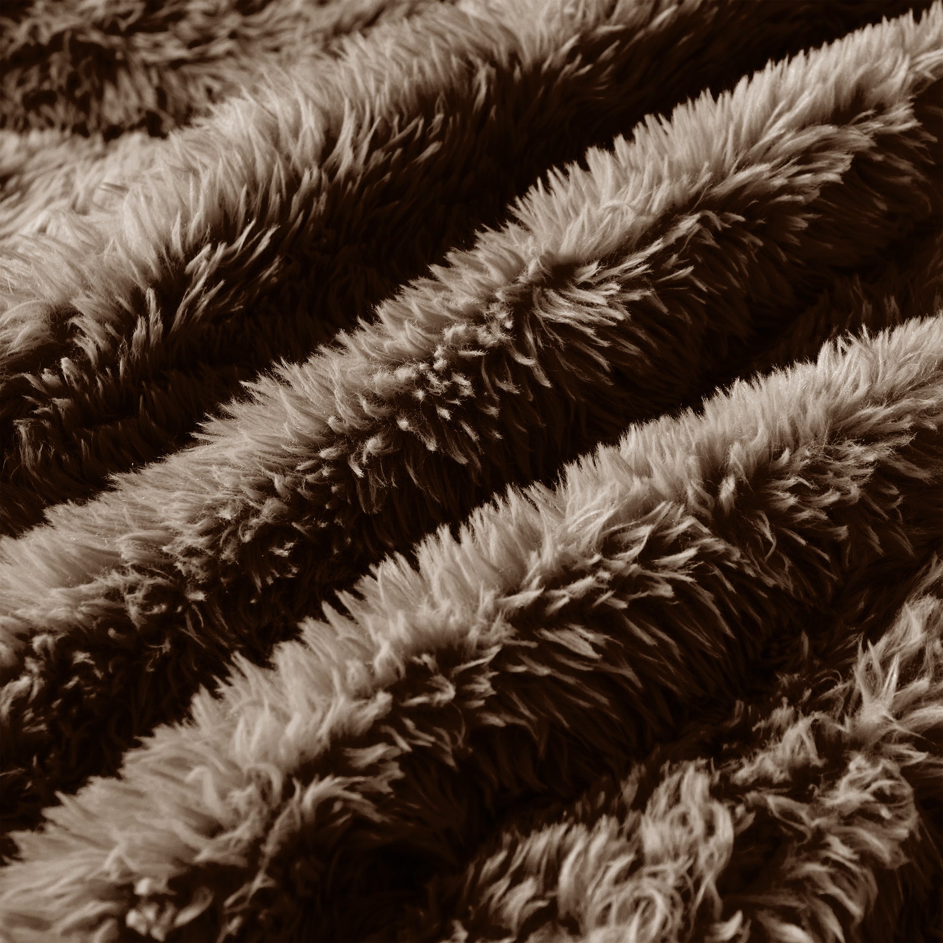 Durham brown sectional sofa showing plush fabric texture detail