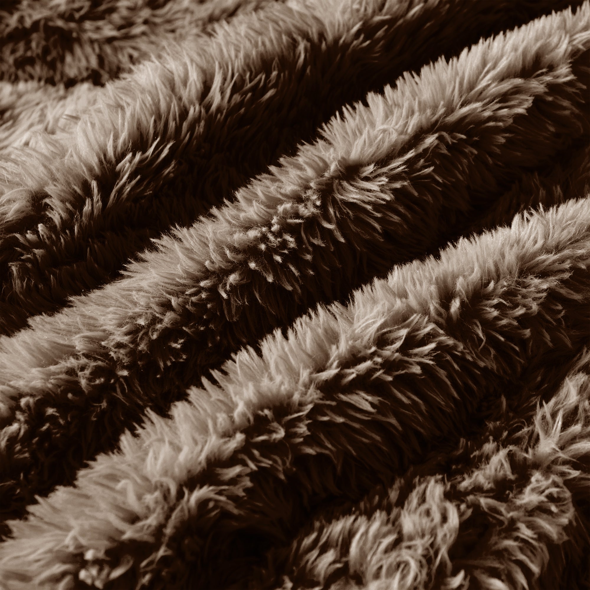 Durham brown sectional sofa showing plush fabric texture detail