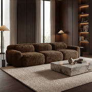 Durham brown sectional sofa showing cozy modern living room setup with plush texture
