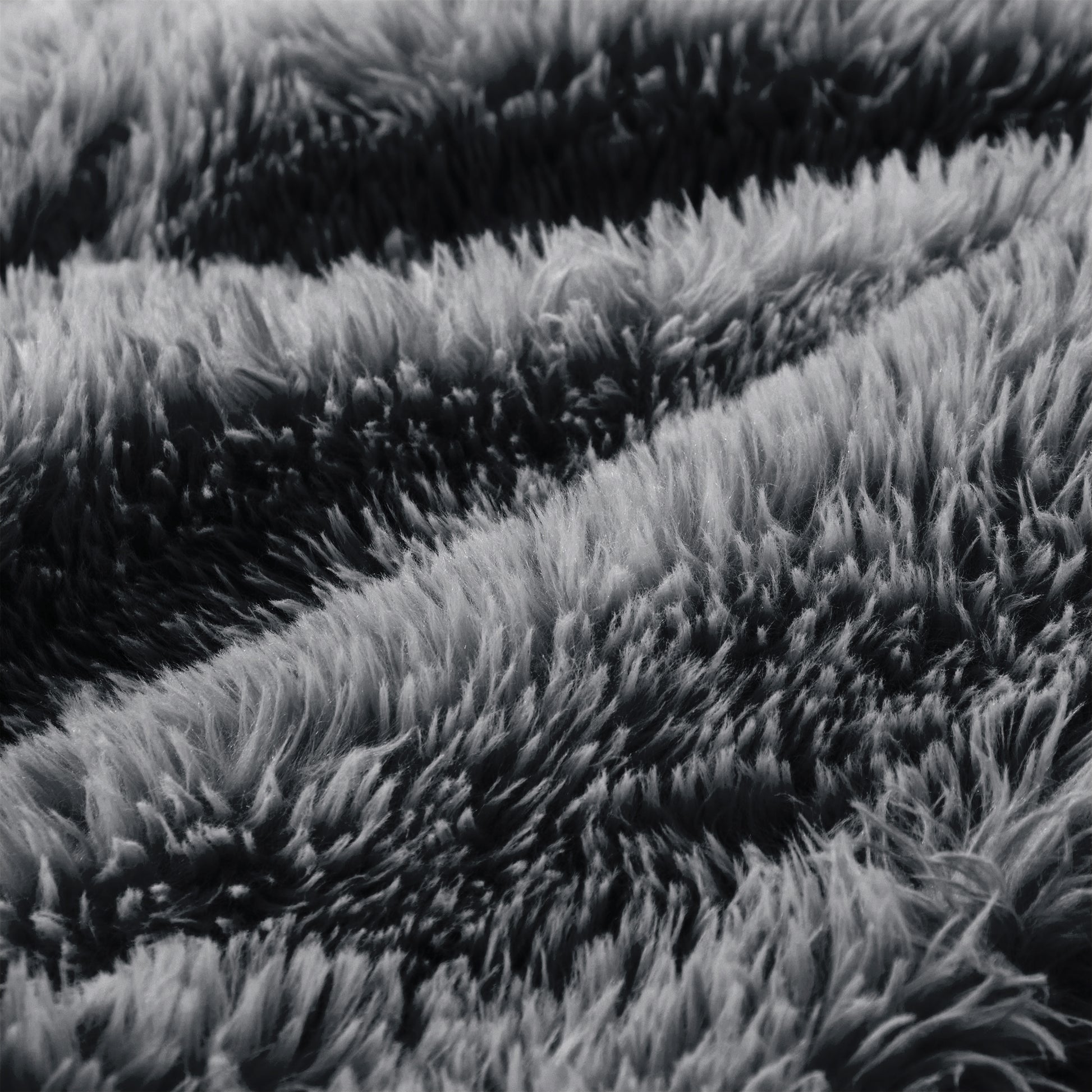 Durham grey sectional sofa showing fluffy fur texture close-up detail