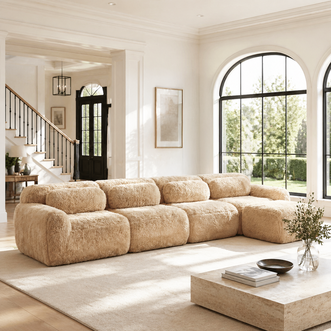 Durham khaki sectional sofa featured in a bright modern living room with floor-to-ceiling arched windows