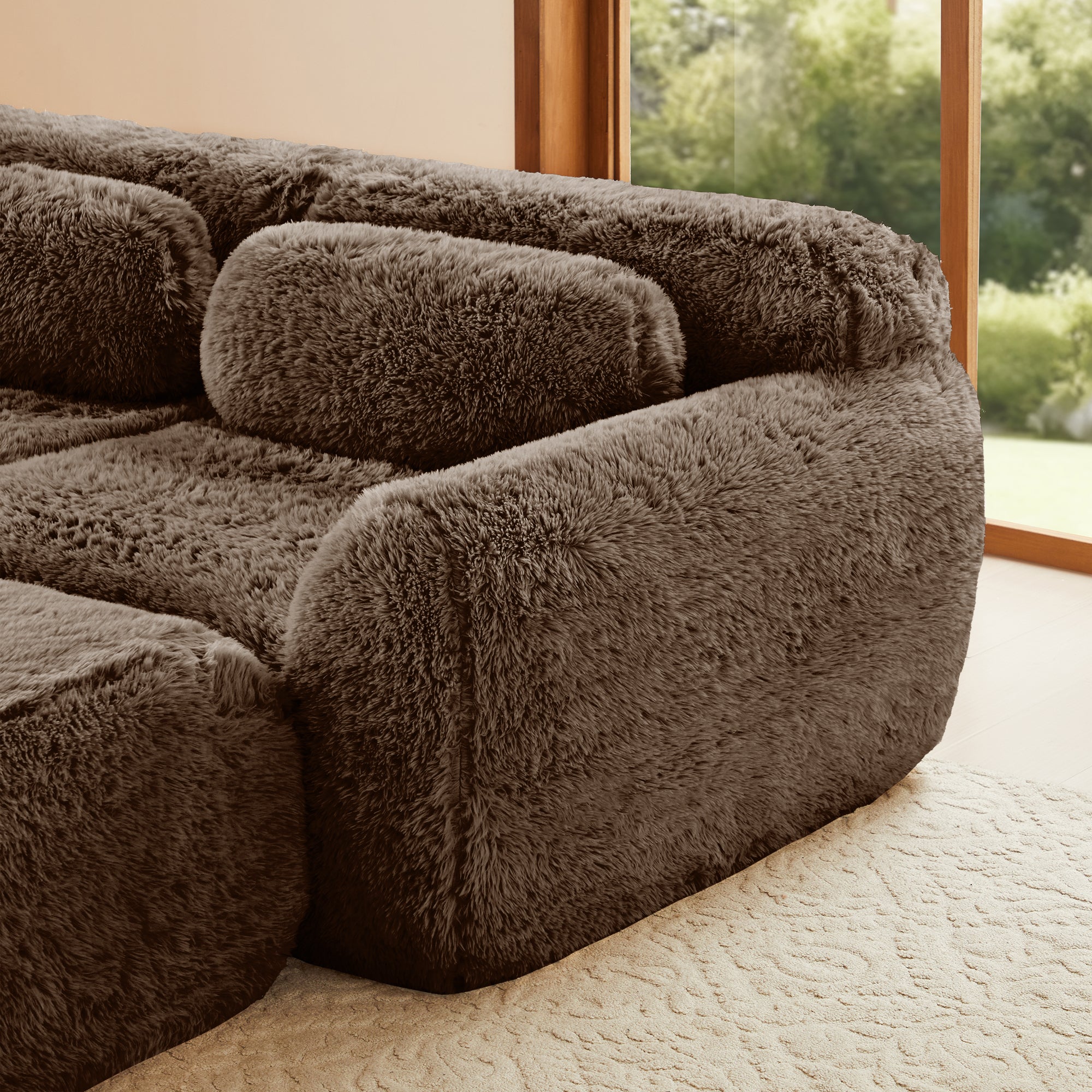Durham brown sectional sofa featuring rounded armrest and thick plush corduroy texture detail