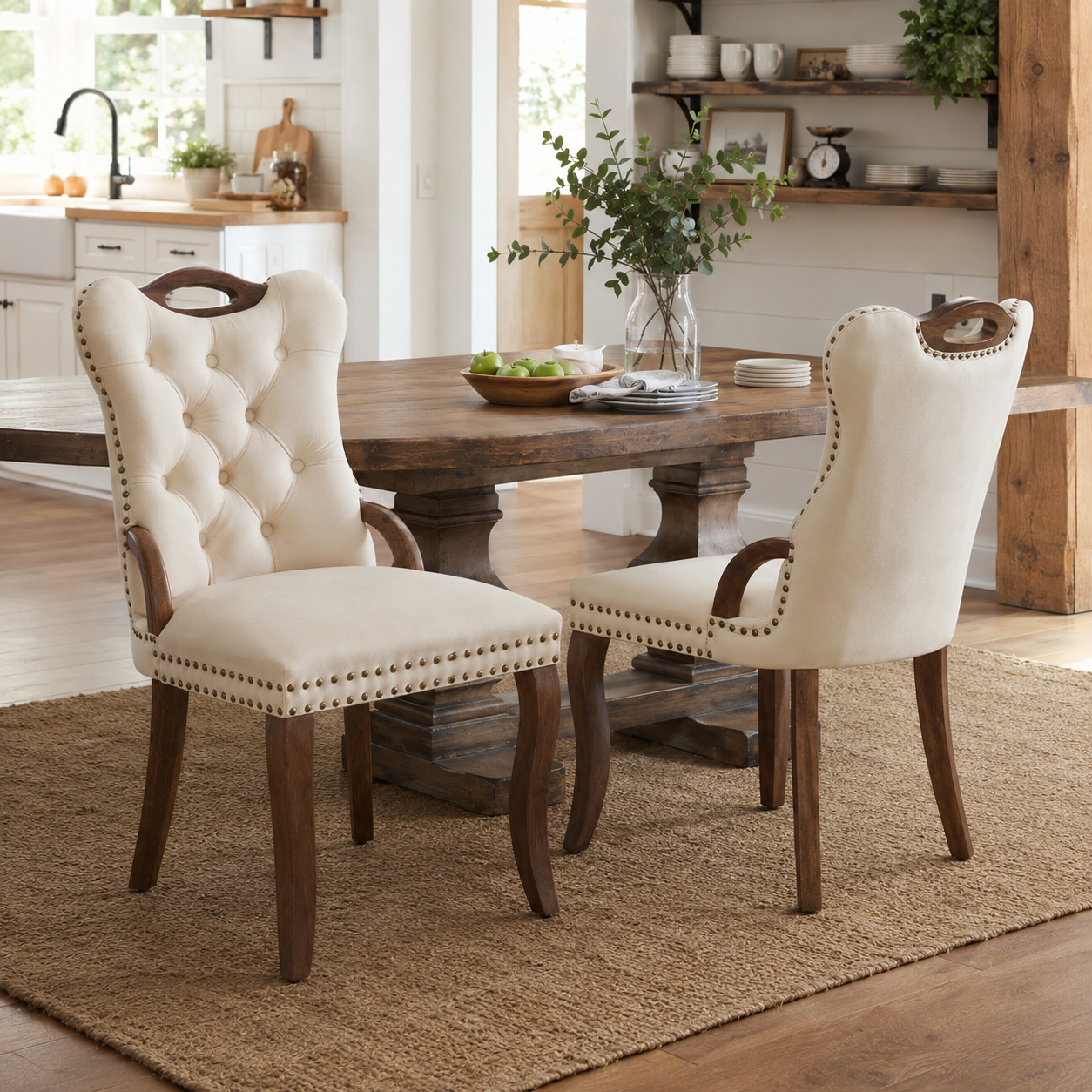 Elbe beige dining chairs showing a pair beside a round table in a warm room with open shelving