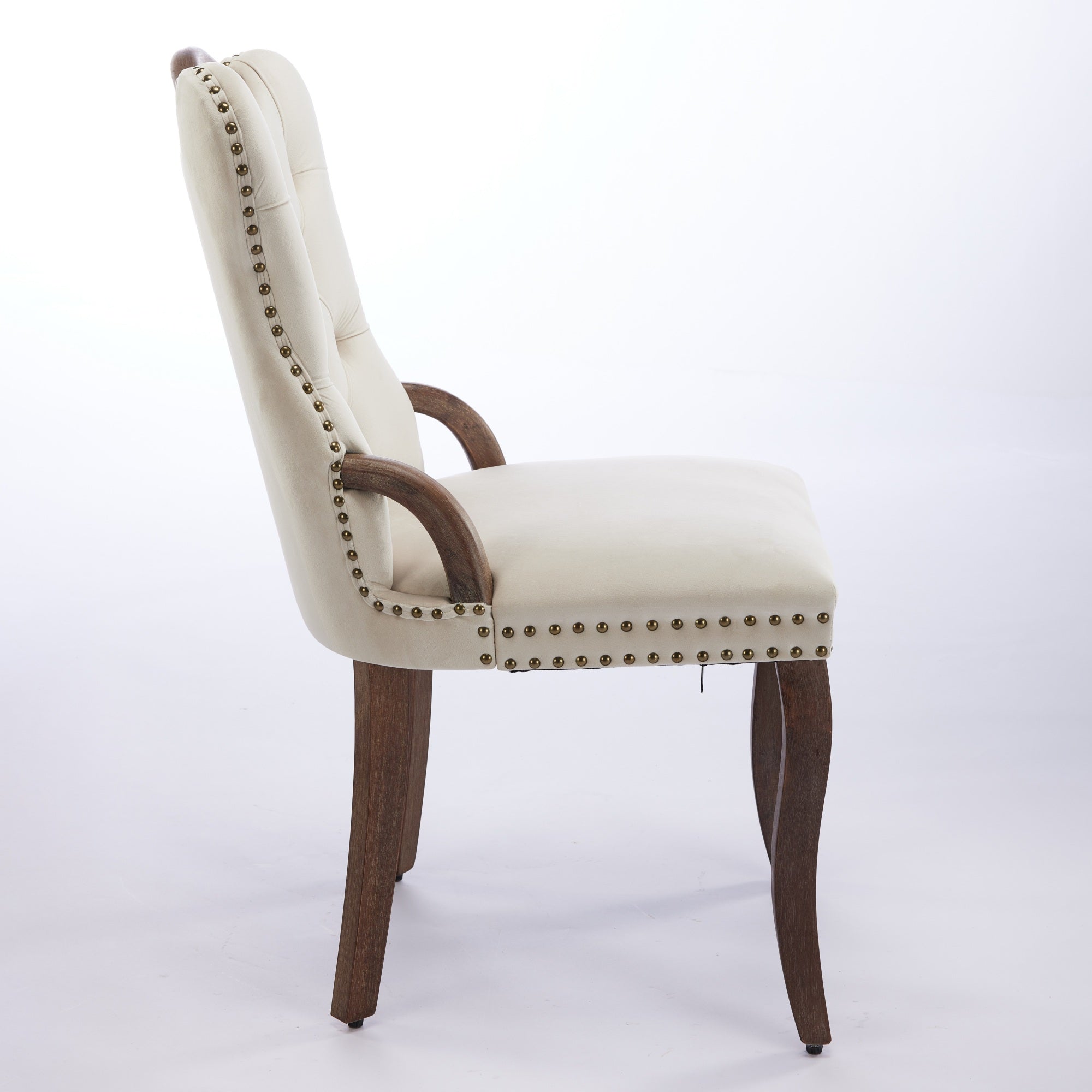 Elbe beige dining chair showing the side profile with curved backrest and tapered wood legs