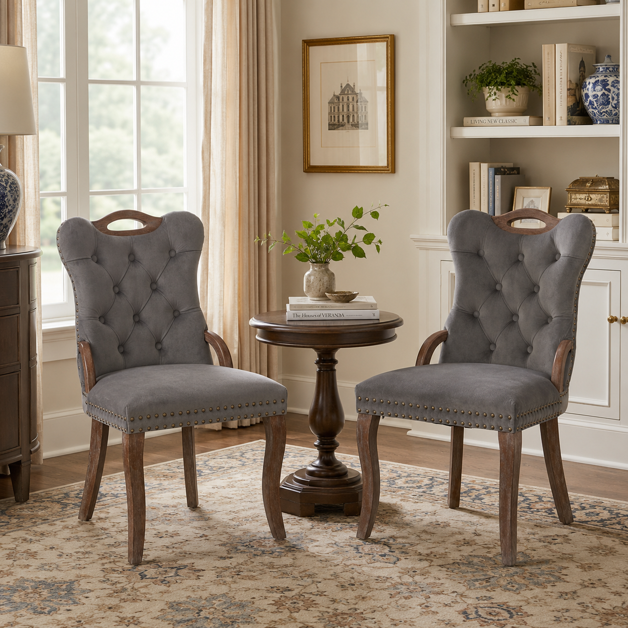Elbe gray dining chairs showing a pair beside a small round table with open shelving