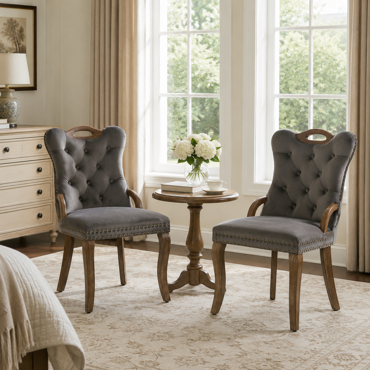 Elbe gray dining chairs showing a pair beside a round table in a bright room with large windows