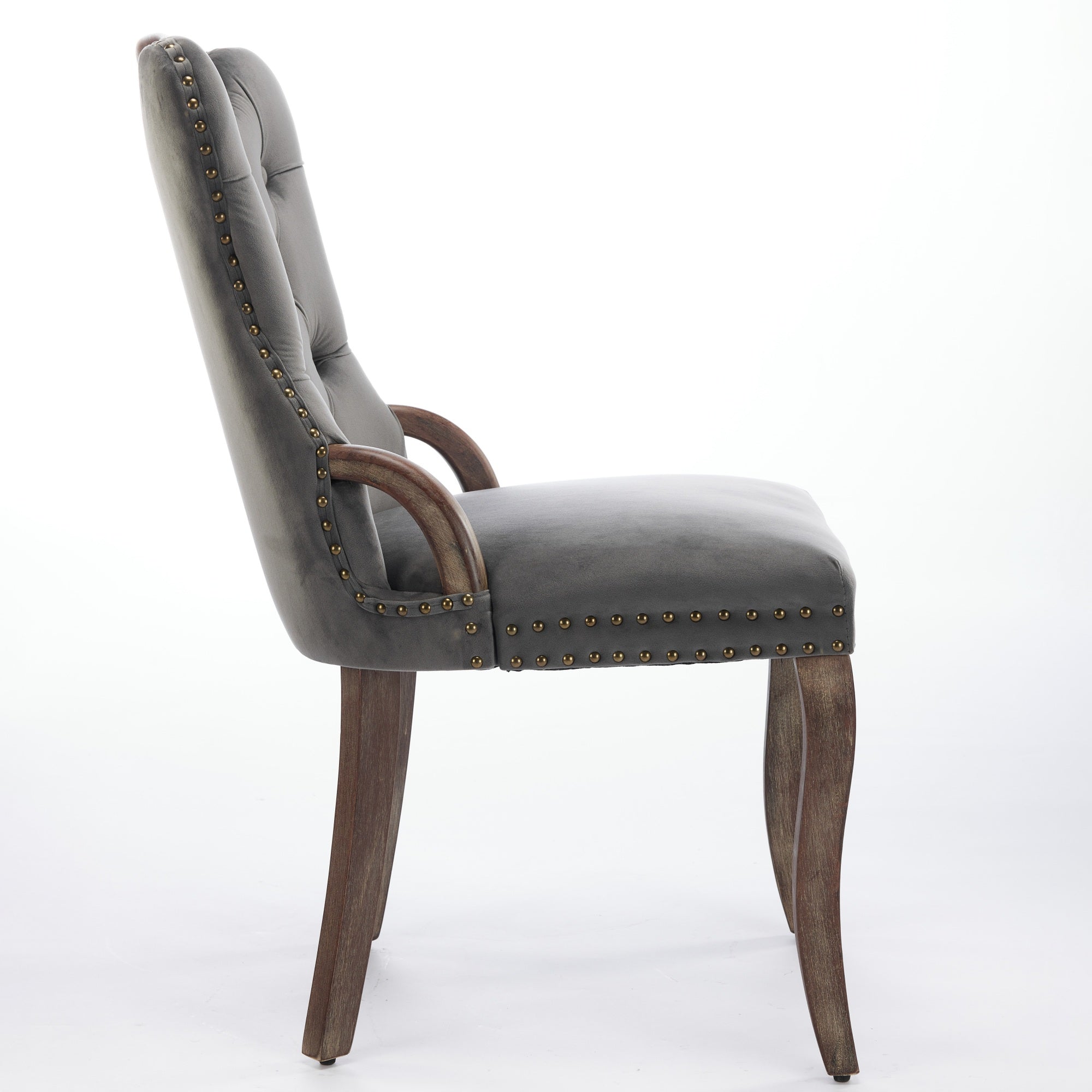 Elbe gray dining chair showing the side profile with a curved backrest and wood legs