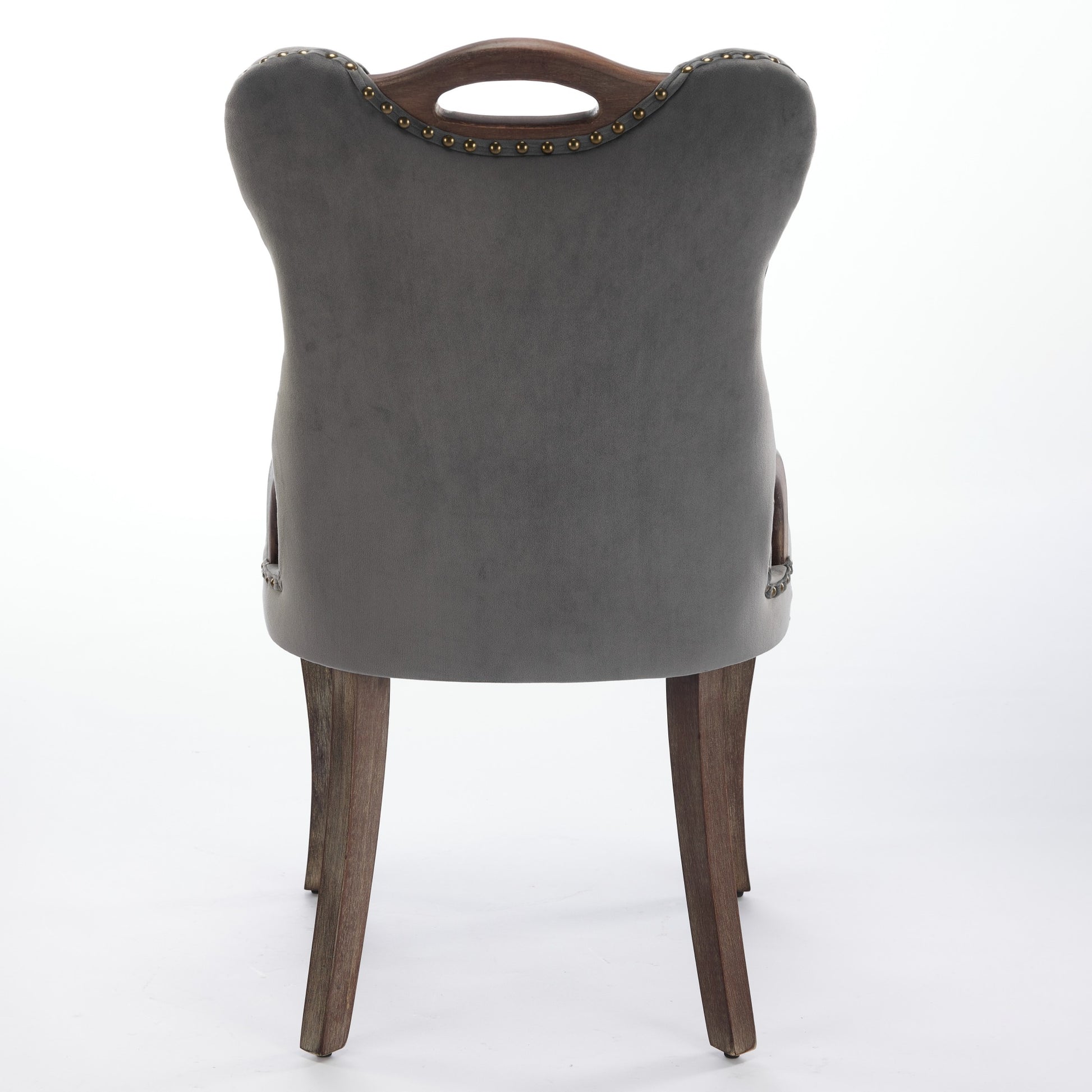 Elbe gray dining chair showing the full rear view with upholstered back and wood handle