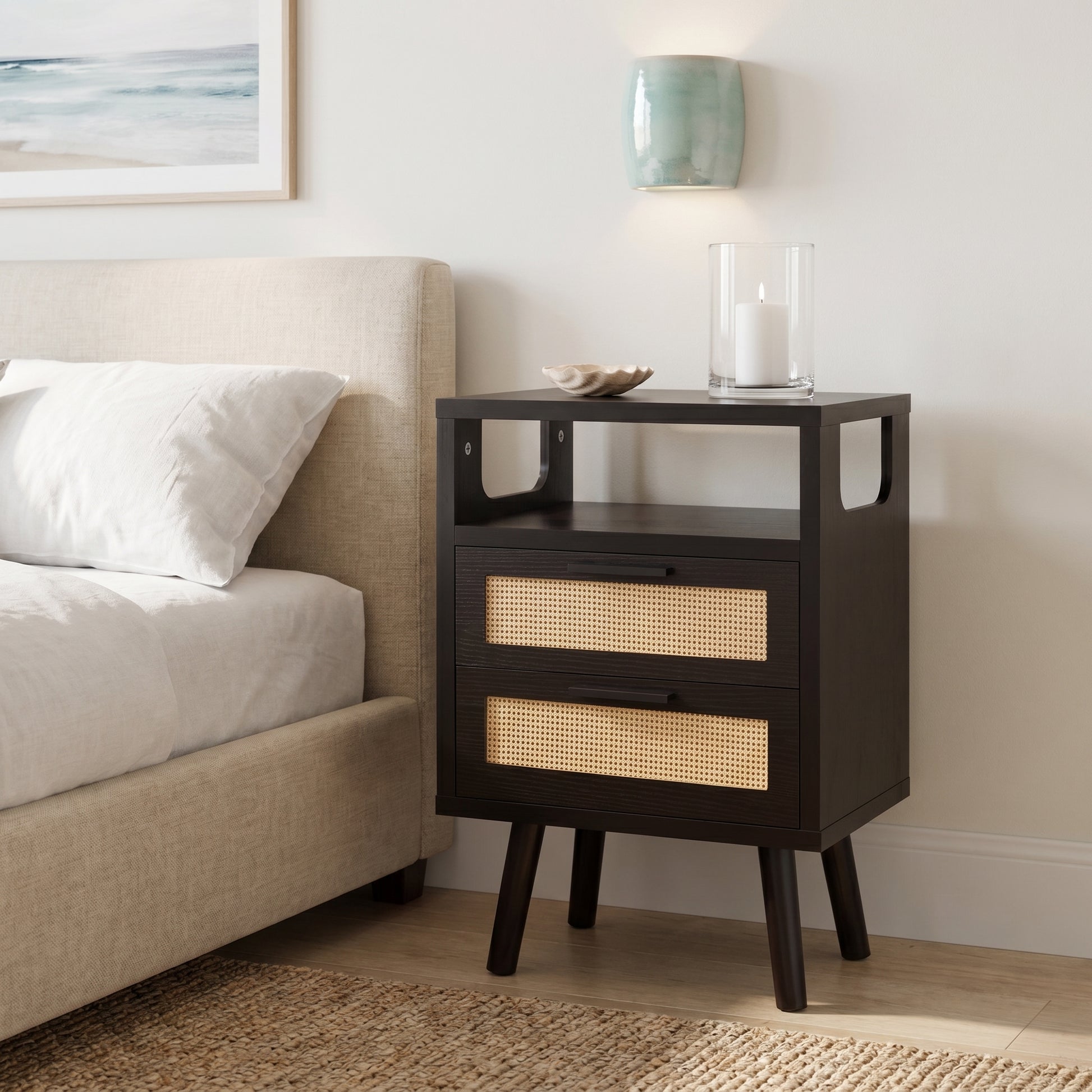 Elowen black nightstand styled beside bed in modern living room