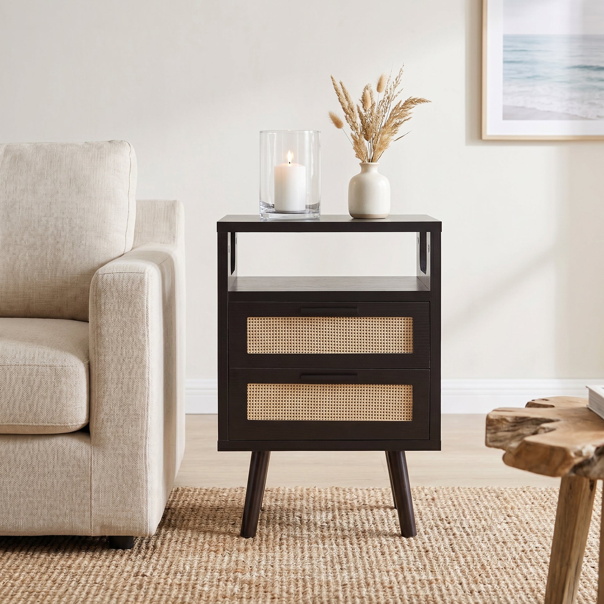 Elowen black nightstand showing compact storage beside upholstered sofa