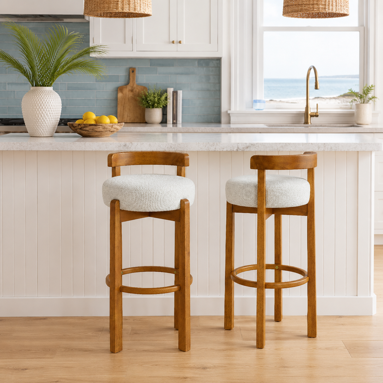 Etna ivory upholstered bar stools beside a kitchen island