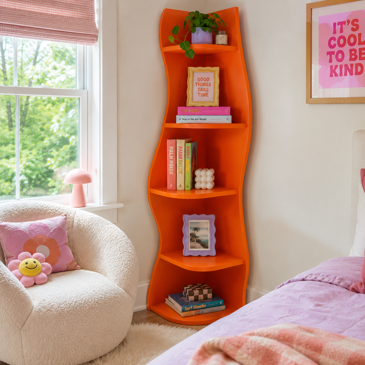 Eureka orange corner bookcase showing open storage in a bright bedroom with pink bedding