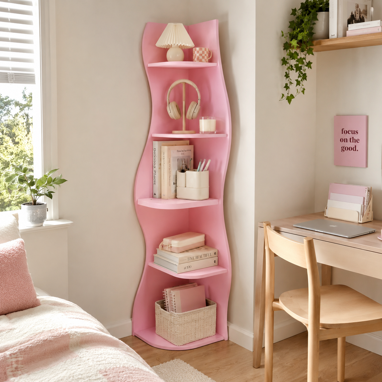 Eureka pink corner bookcase showing five-tier storage in a bright children’s room