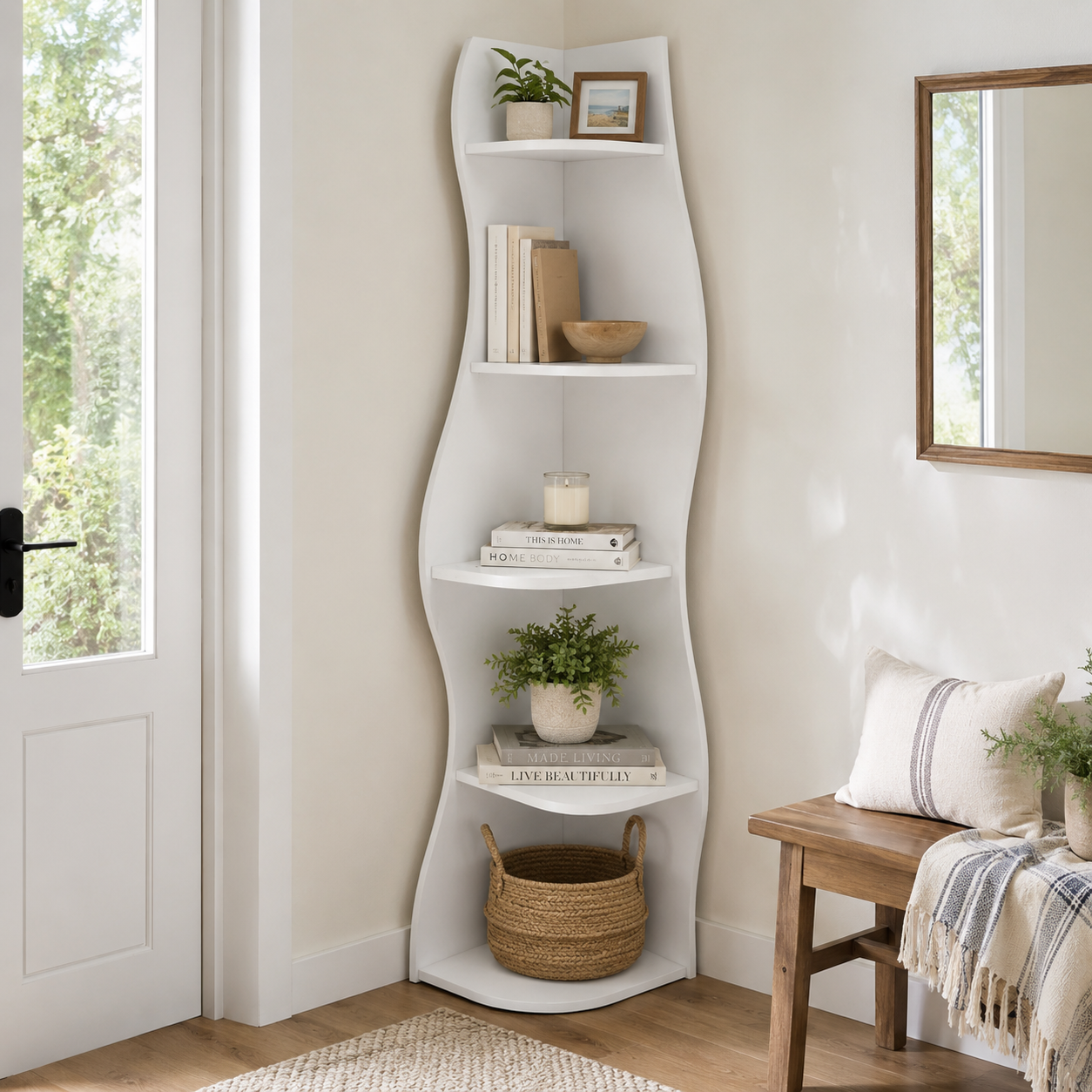 Eureka white corner bookcase showing decorative storage beside an armchair in a neutral room