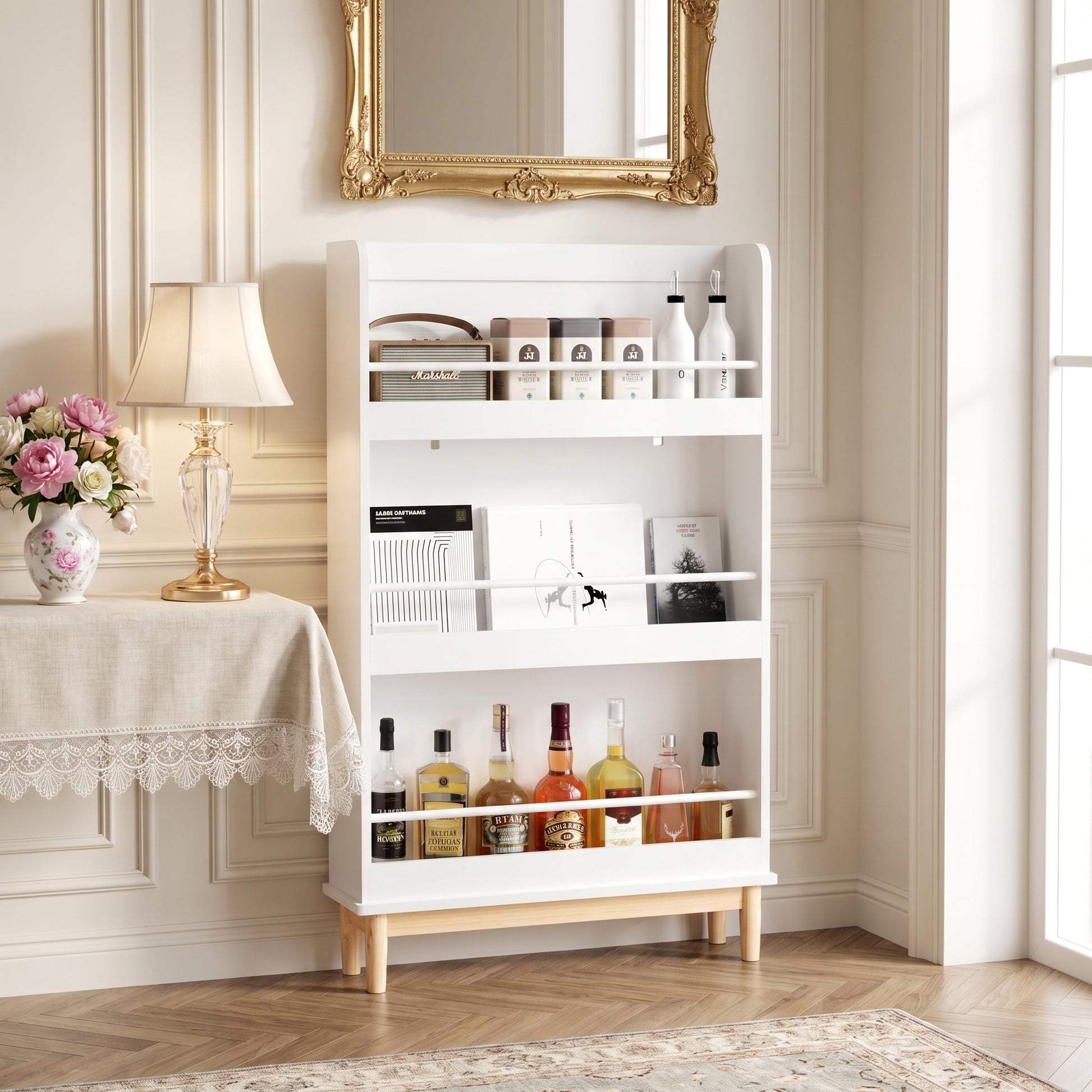 Fawn white bookshelf showing front-facing book storage beside a wall mirror