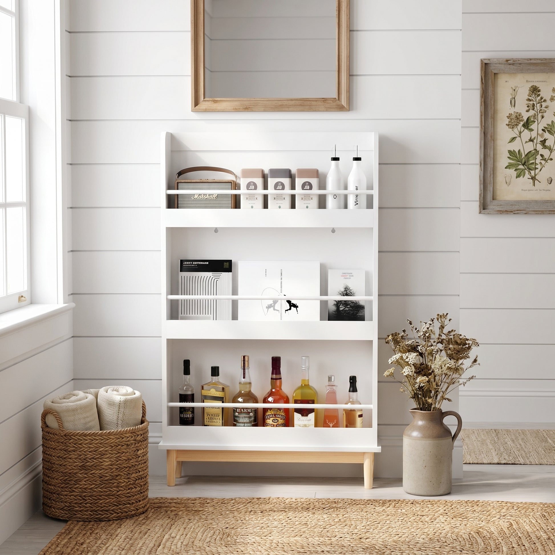 Fawn white bookshelf showing organized books and accessories beside framed wall art