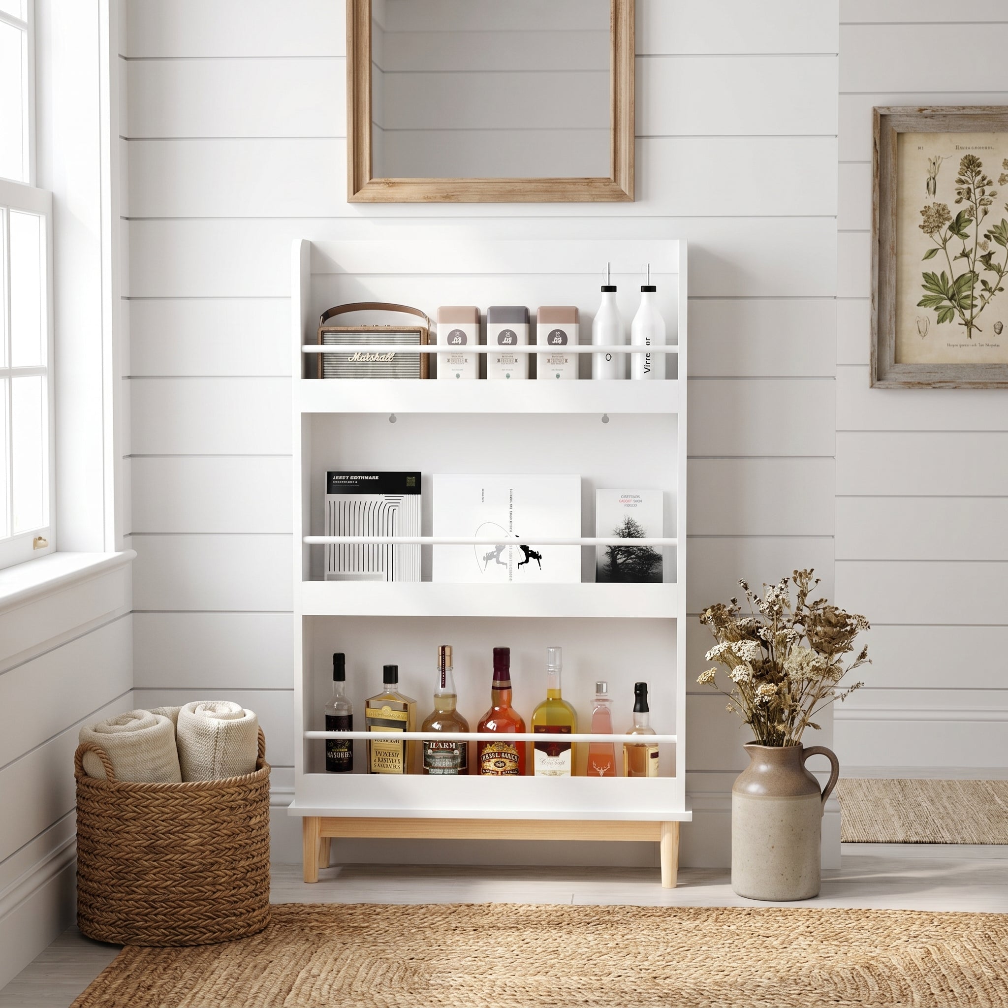 Fawn white bookshelf showing organized books and accessories beside framed wall art