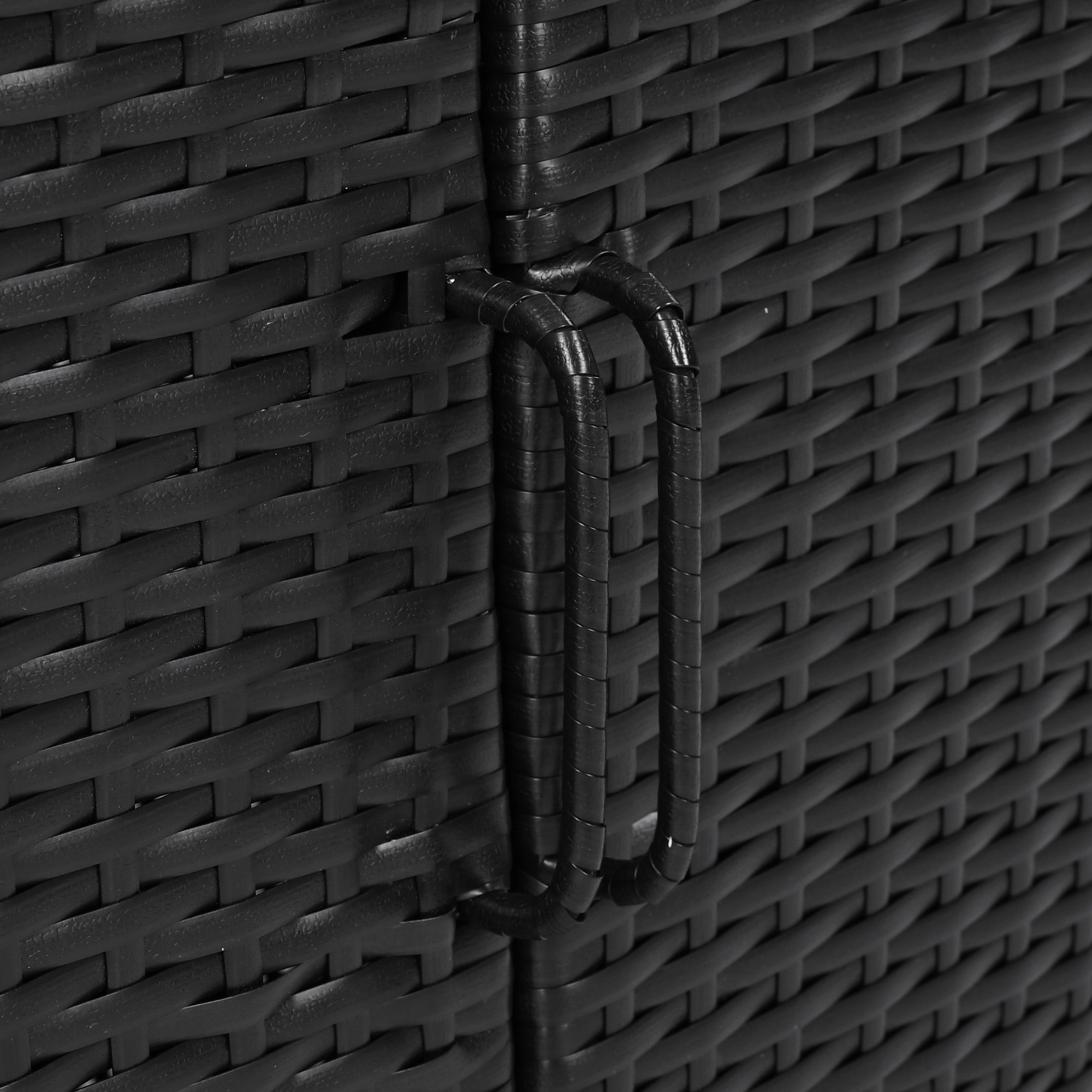 Ferrara black storage cabinet showing integrated wicker door handle and woven texture detail