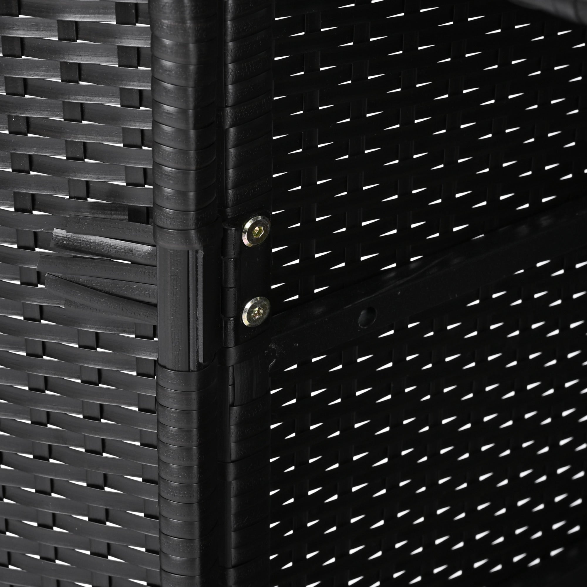 Ferrara black storage cabinet showing metal hinge and reinforced wicker frame detail