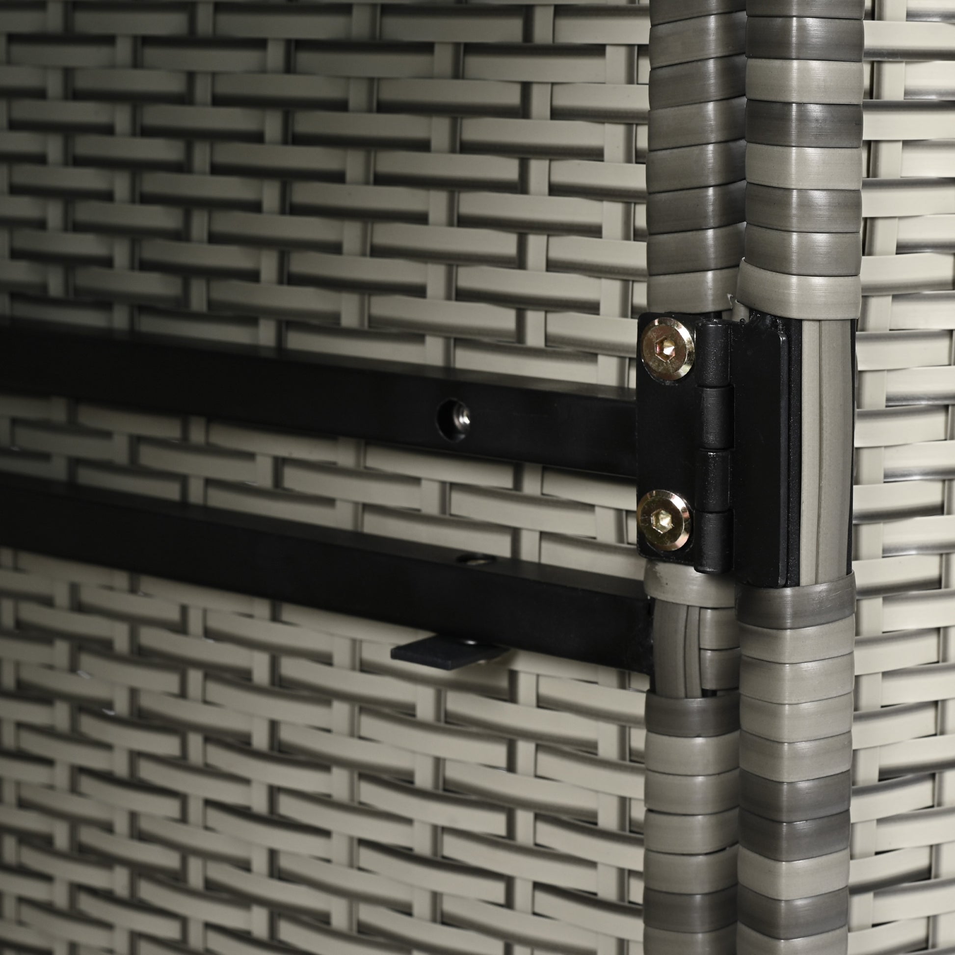 Ferrara gray storage cabinet showing metal hinge and reinforced wicker frame detail