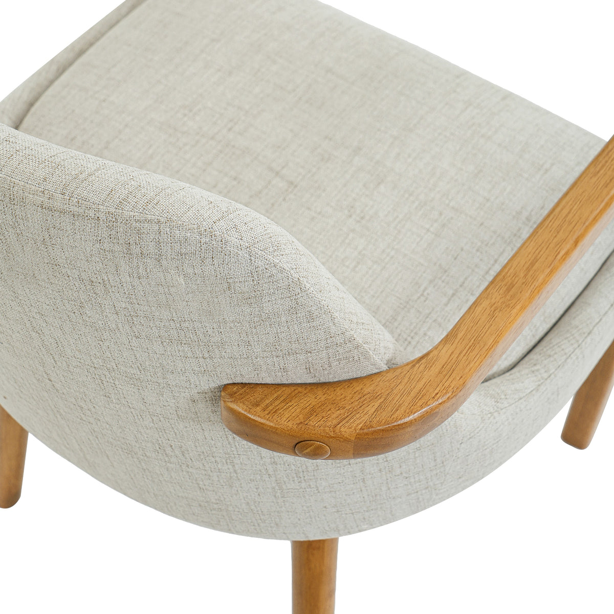 Geneva beige dining chair close-up of the upholstered seat and wood armrest detail