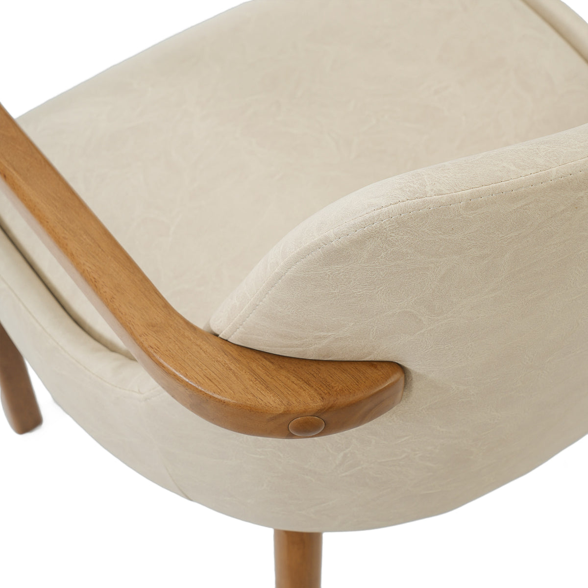 Geneva khaki dining chair close-up of the upholstered seat edge and curved wood armrest