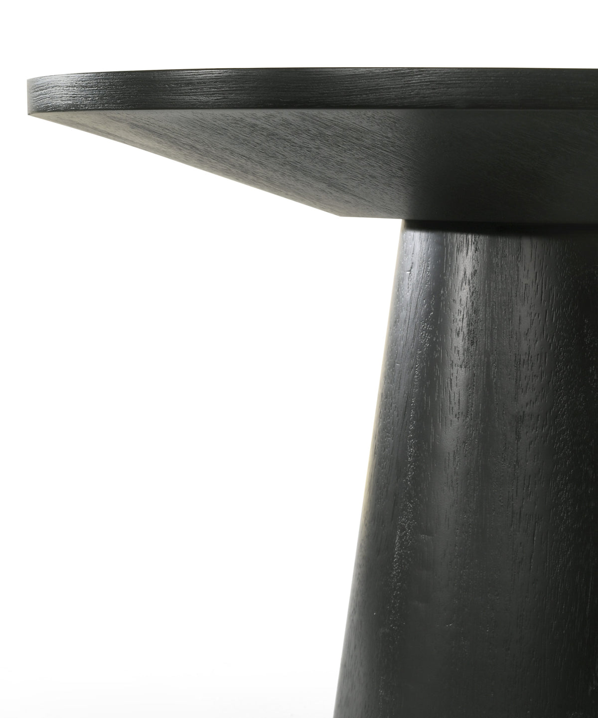 Genoa black coffee table close-up of the tabletop edge and pedestal connection
