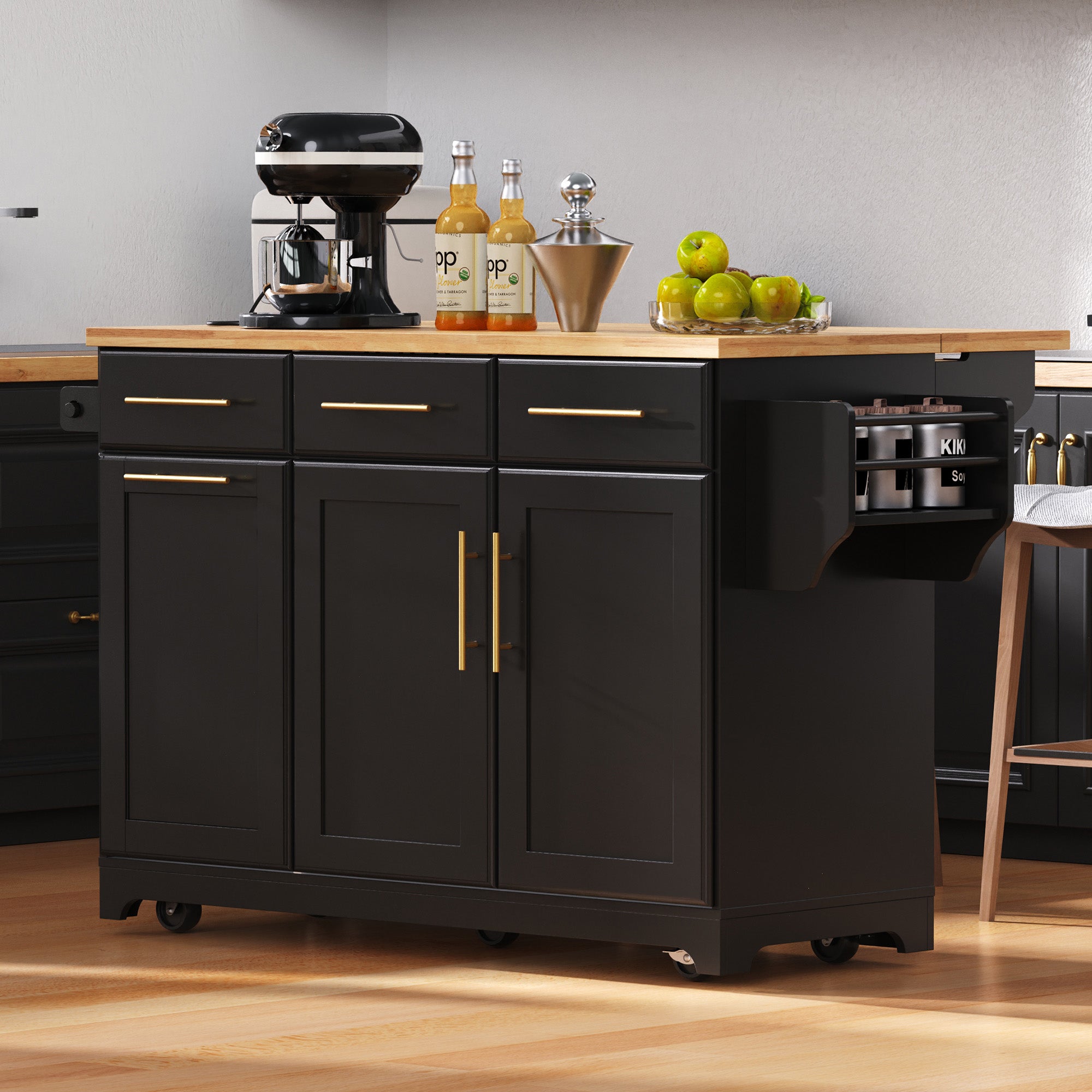 Honfleur black rolling kitchen island with rubberwood countertop spice rack storage drawers and cabinet doors in modern kitchen setting