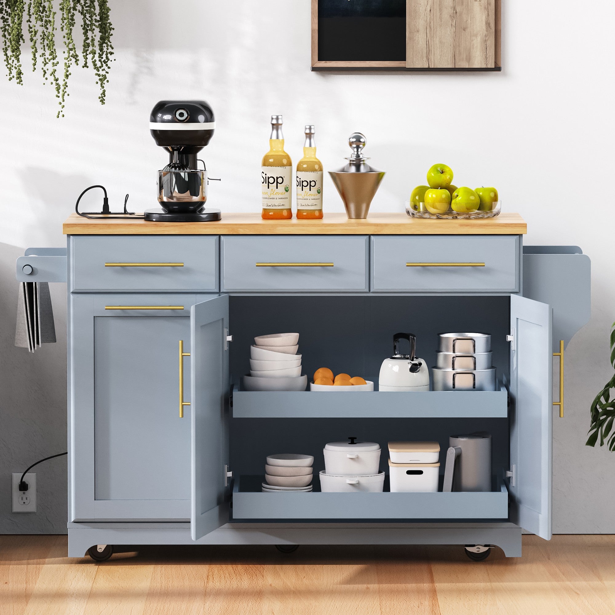 Honfleur gray rolling kitchen island with open cabinet doors adjustable double shelf storage and rubberwood countertop in kitchen setting