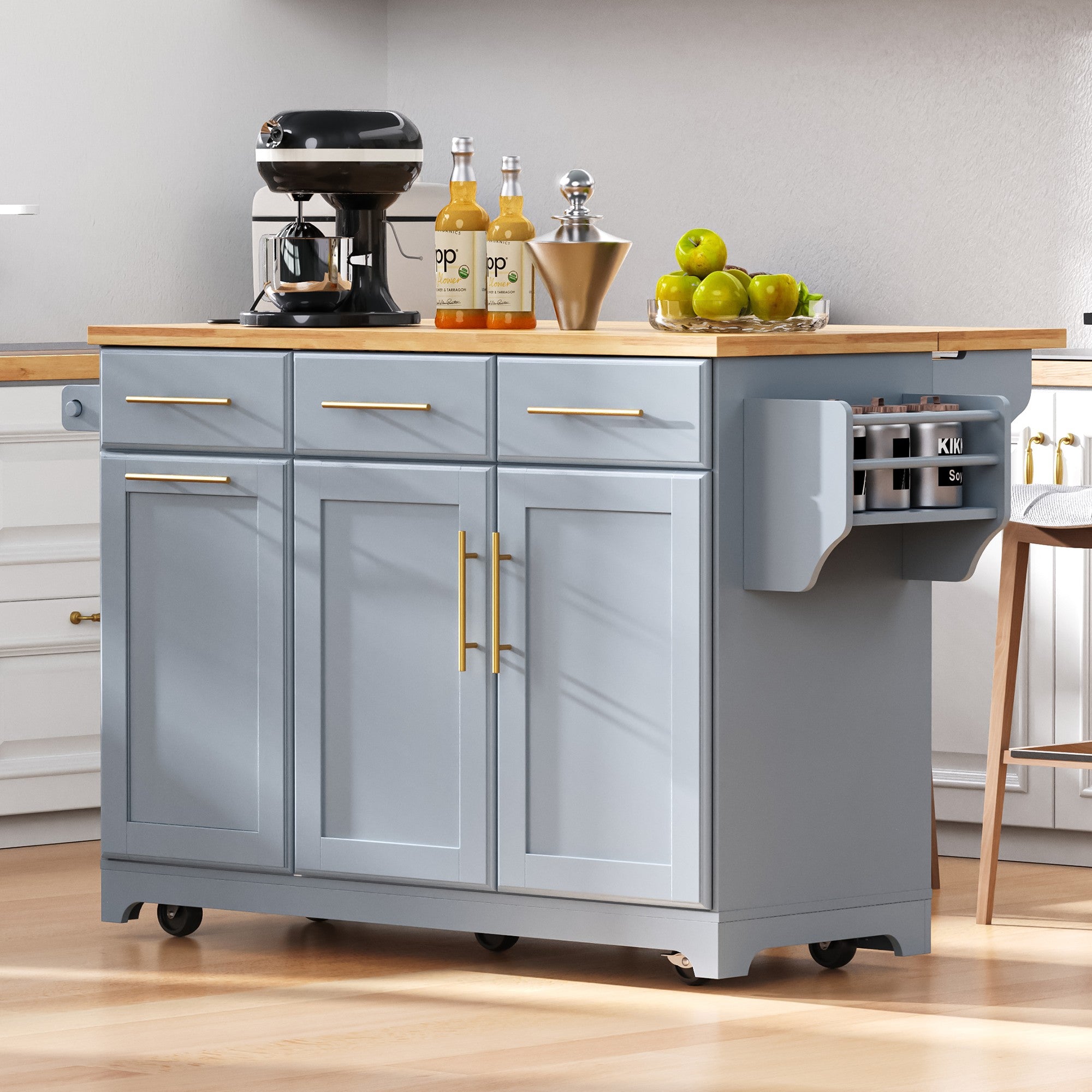 Honfleur gray rolling kitchen island with rubberwood countertop spice rack storage drawers and cabinet doors in modern kitchen setting