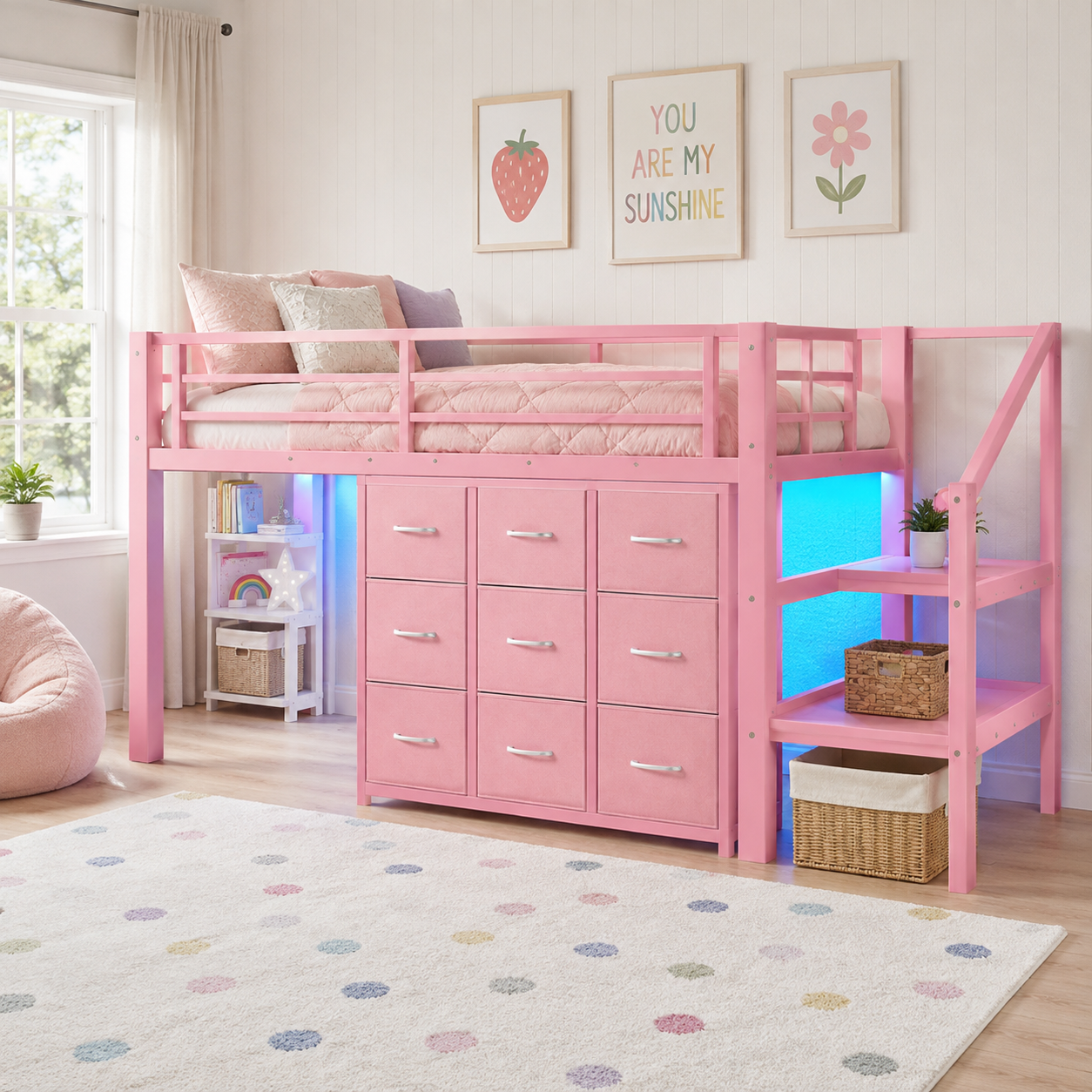 Isella pink loft bed showing storage drawers and stairs in a bright colorful bedroom