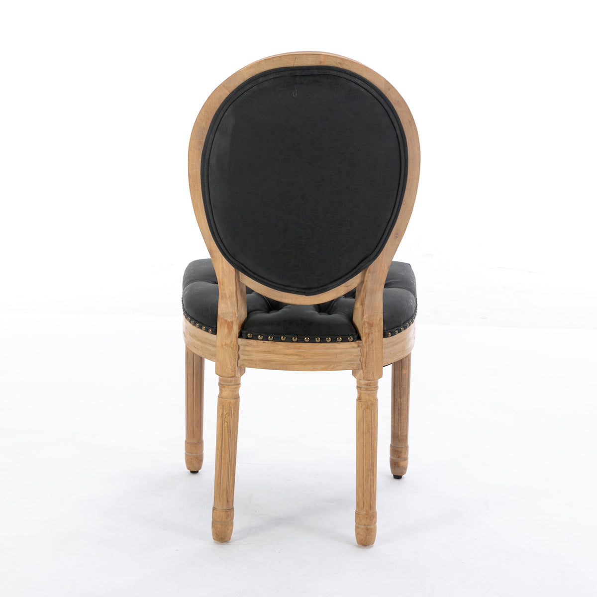 Iseo black tufted dining chair rear view with solid rubberwood frame on white background