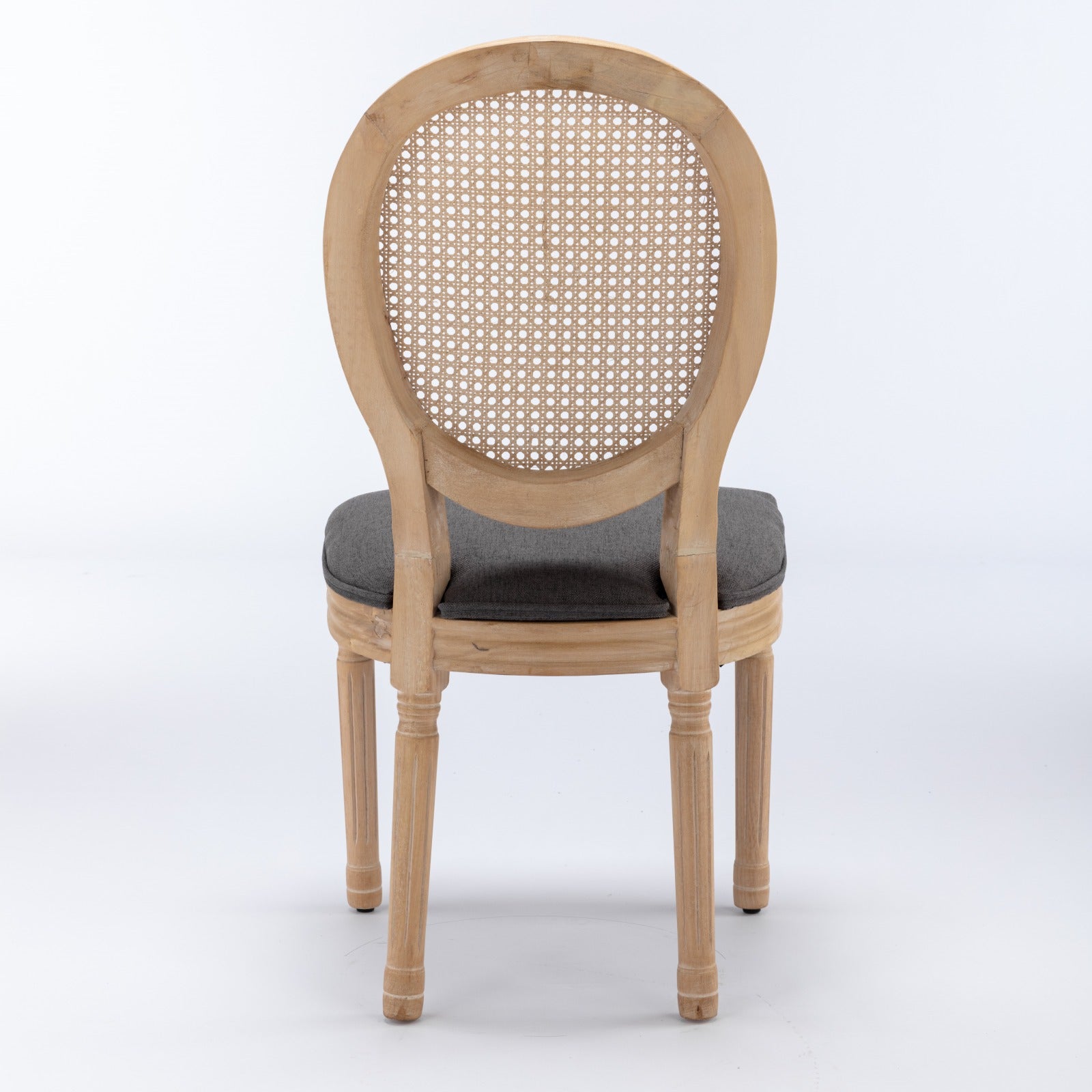 Iseo gray dining chair rear view with oval cane backrest on white background