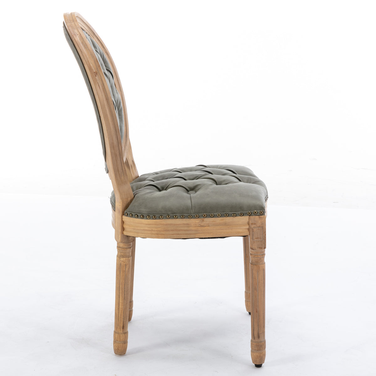 Iseo green PU leather dining chair side view with solid rubberwood legs on white background