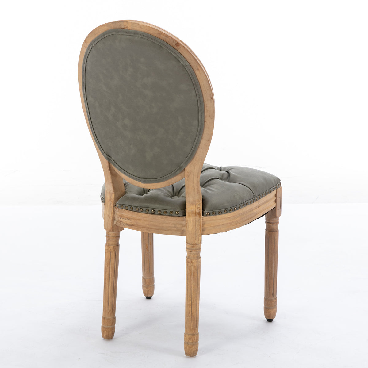 Iseo green dining chair rear view with oval upholstered backrest on white background