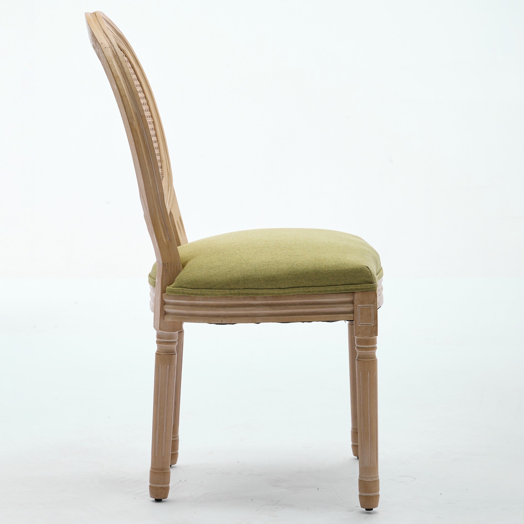 Iseo green upholstered dining chair side view on white background