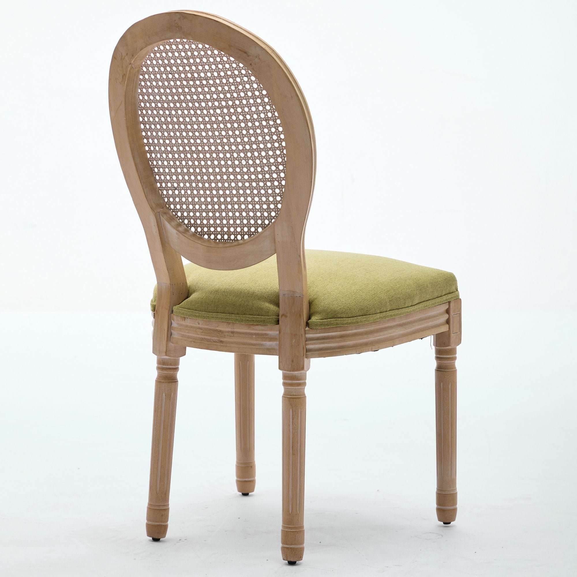 Iseo green dining chair rear view with oval cane backrest on white background