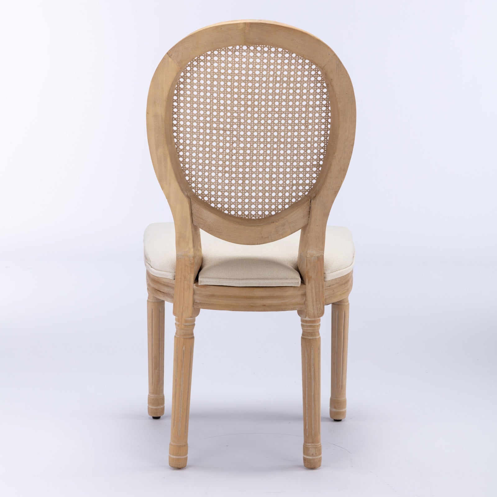 Iseo white dining chair rear view with oval cane back on white background