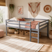 Ivara grey loft bed showing a full size low loft bed with full-length guardrails in a bright bedroom